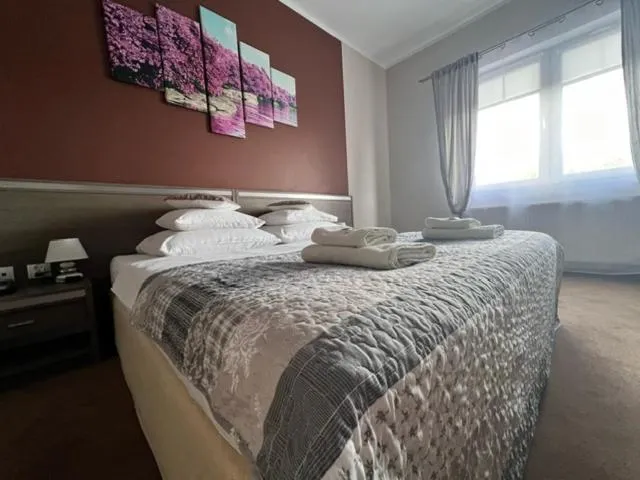 Bed in Magnolia Hotel&Restauracja