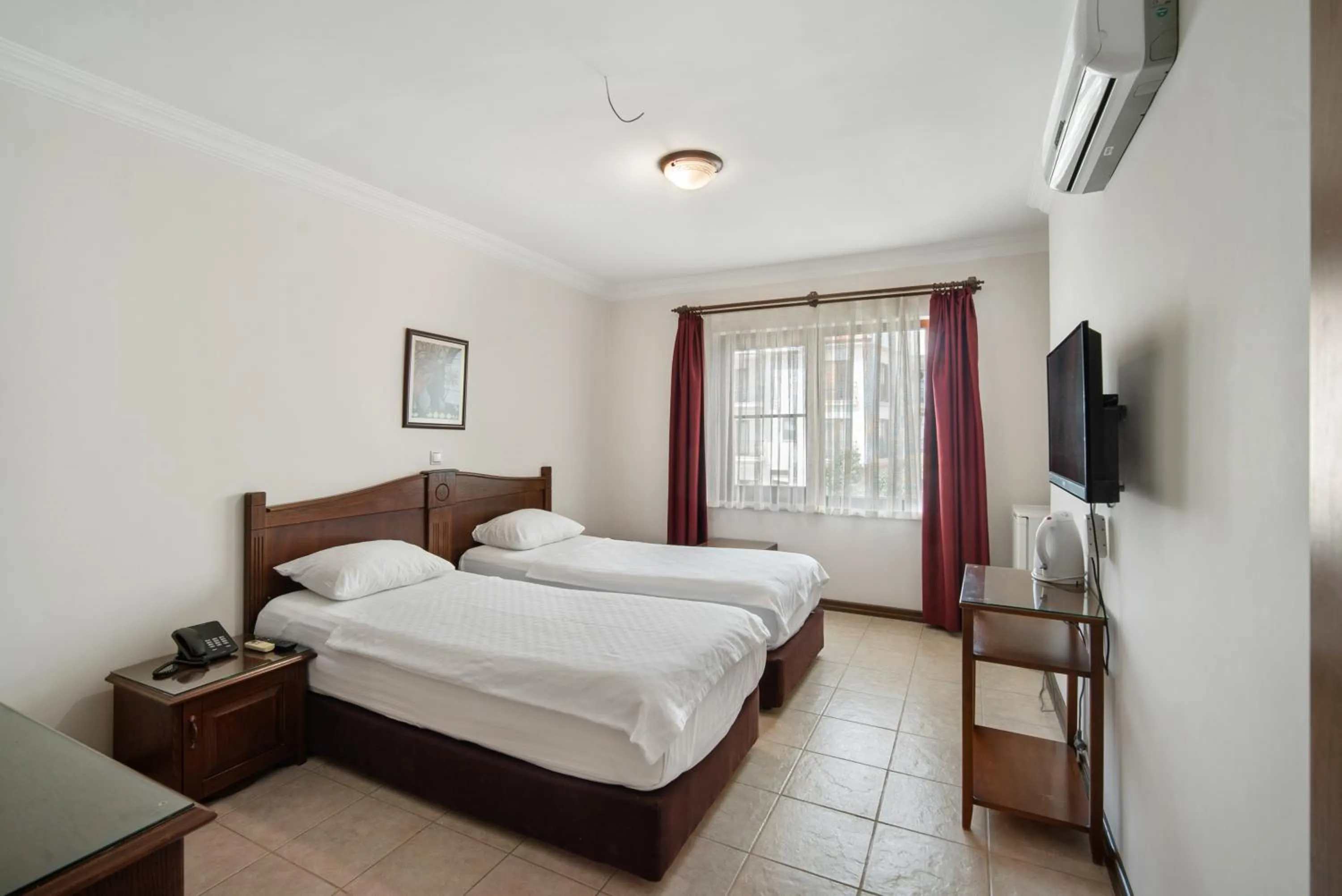 Bed in Fora Apart Hotel