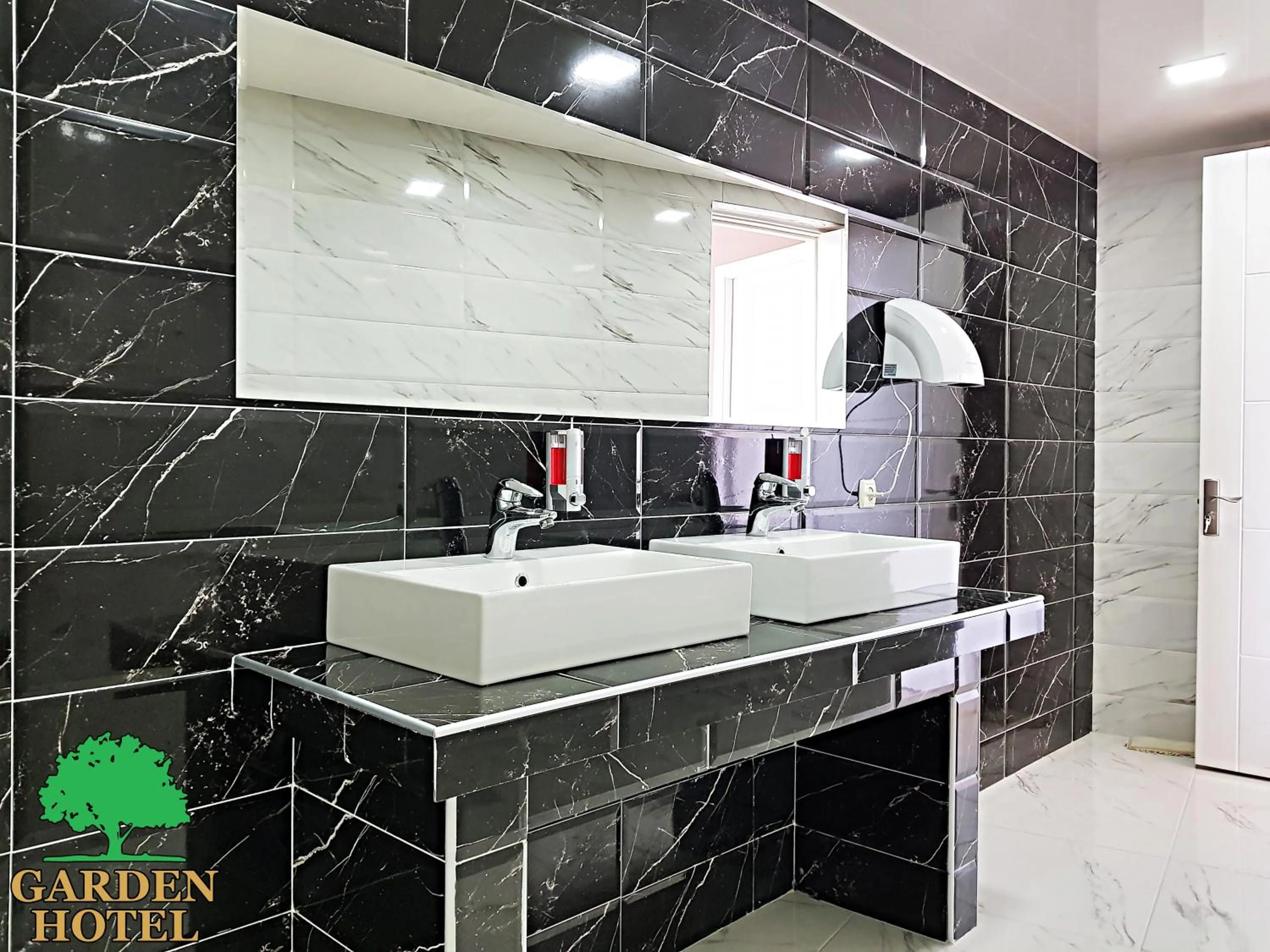 Lobby or reception in Garden Hotel