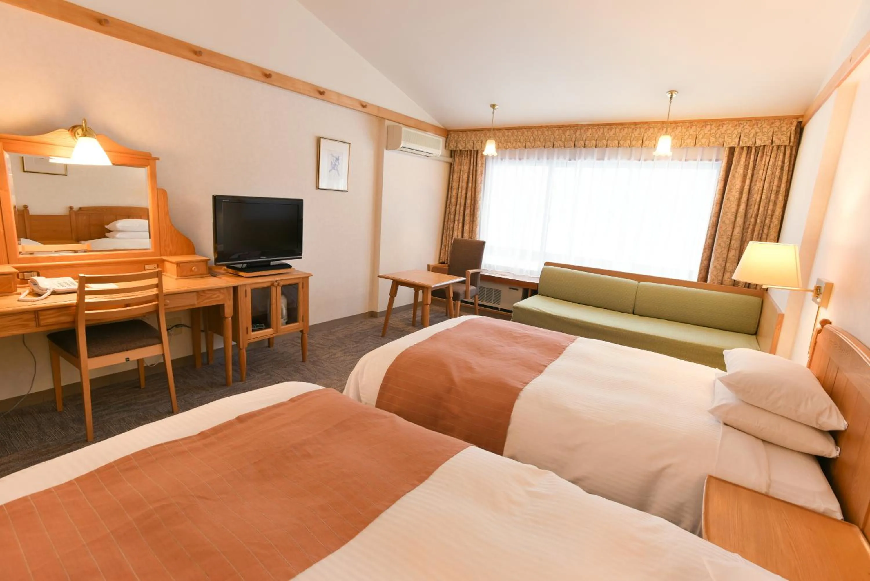 Bed in Sahoro Resort Hotel
