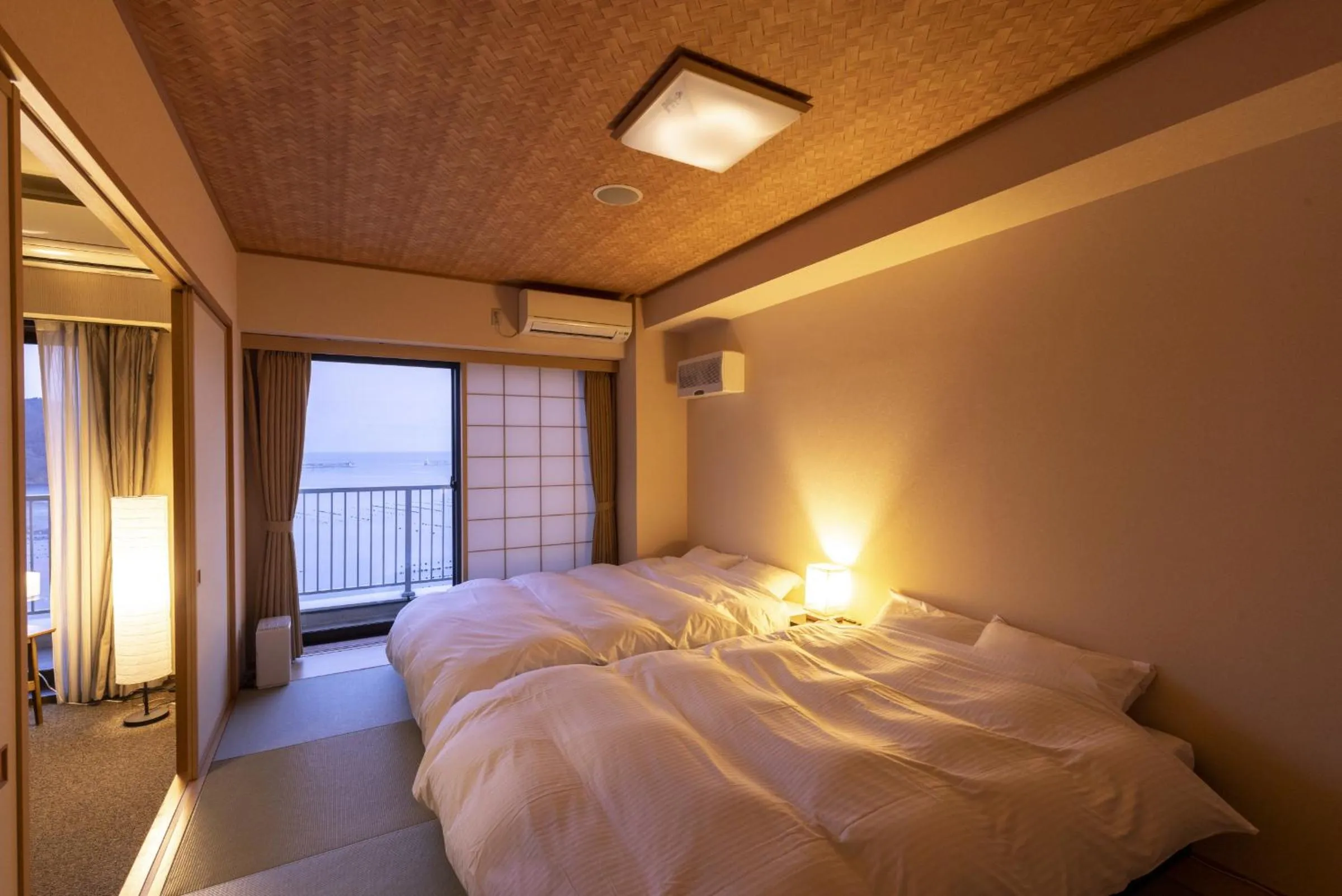 Photo of the whole room, Bed in Ofunato Onsen