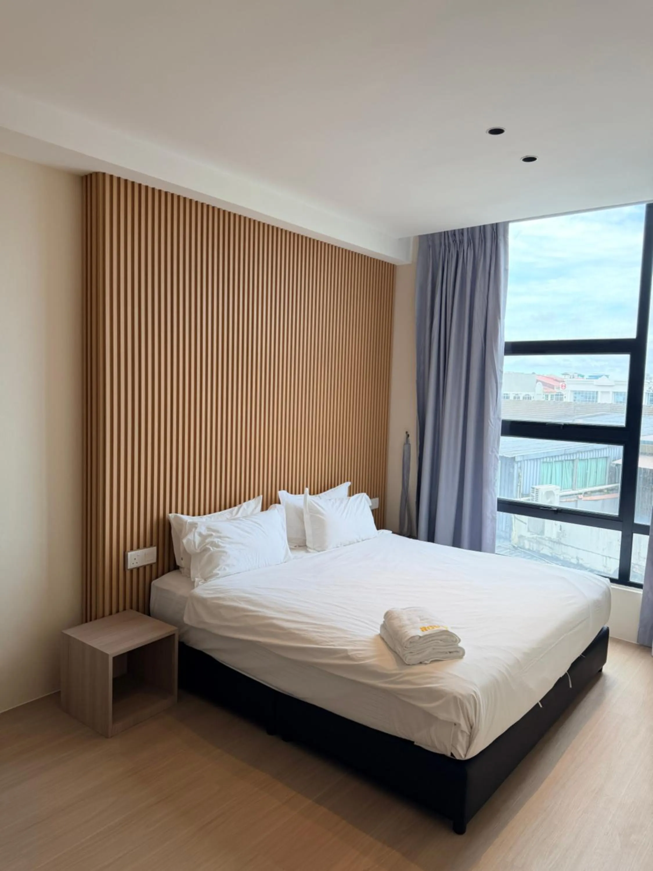 Bedroom, Bed in Roxy Hotel 3rd Mile