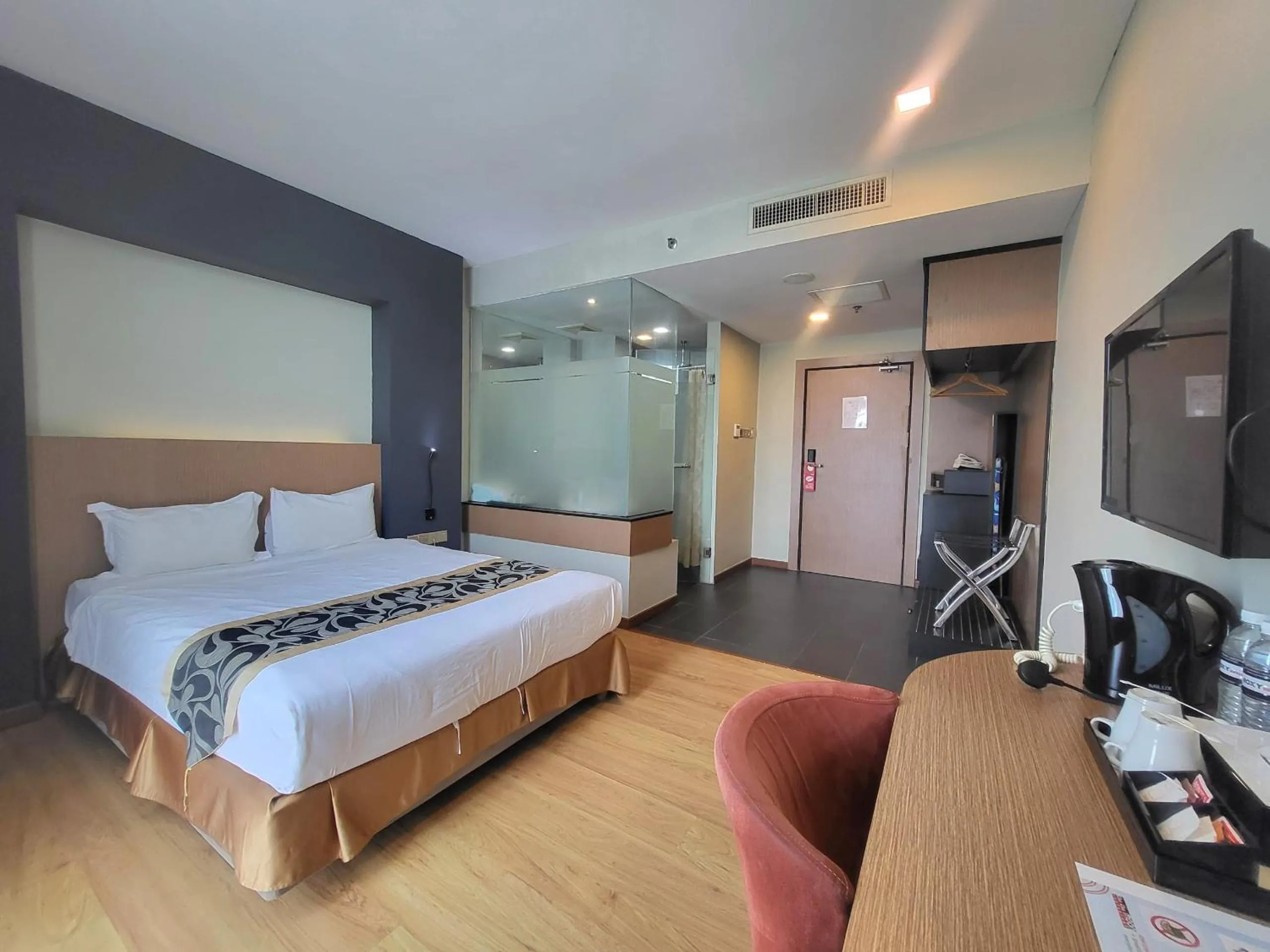 Bed in Roxy Hotel & Apartments