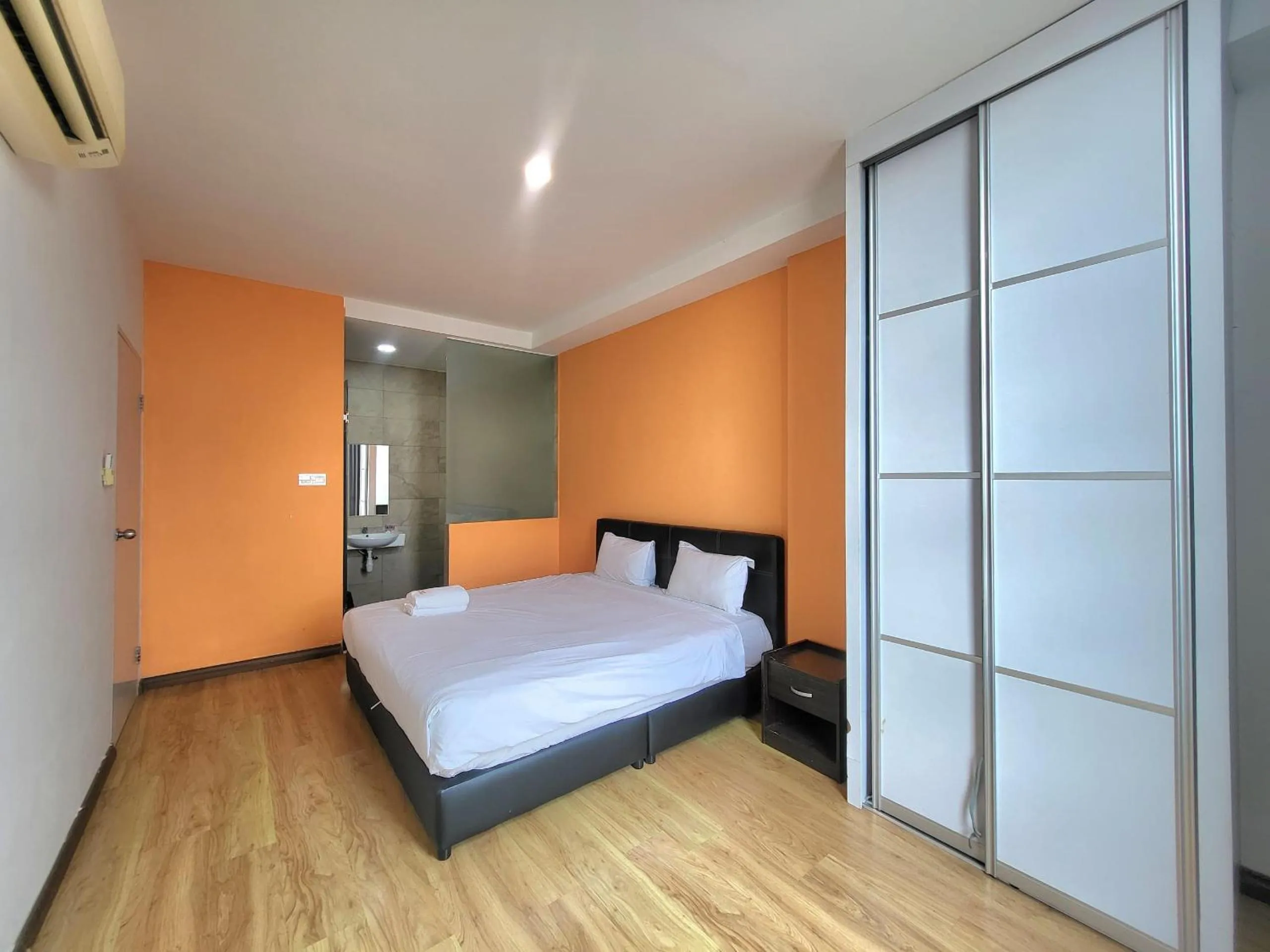 Bed in Roxy Hotel & Apartments