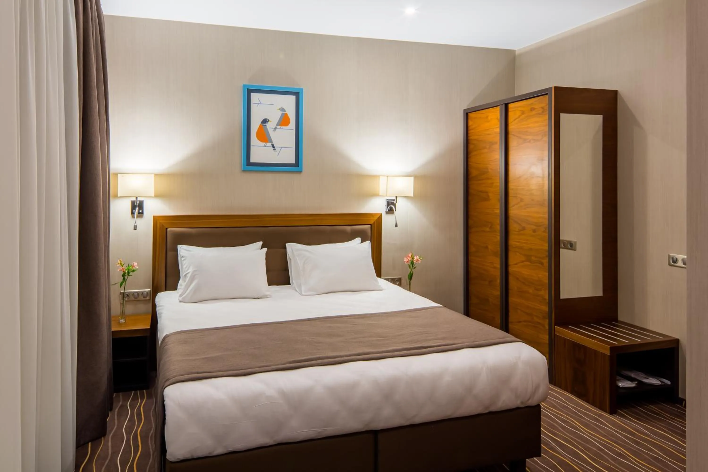 Bed in Taurus City Hotel