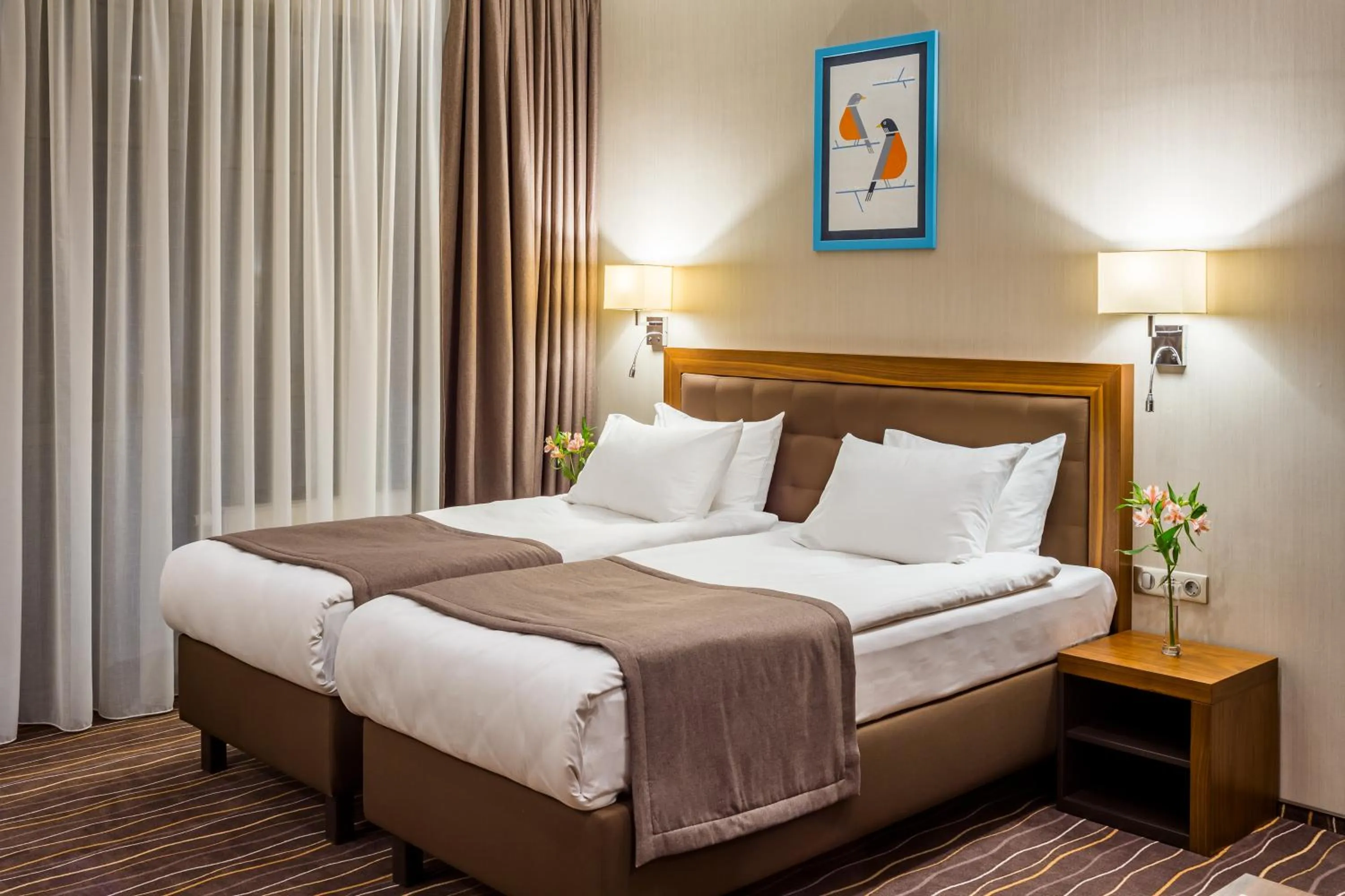 Bed in Taurus City Hotel