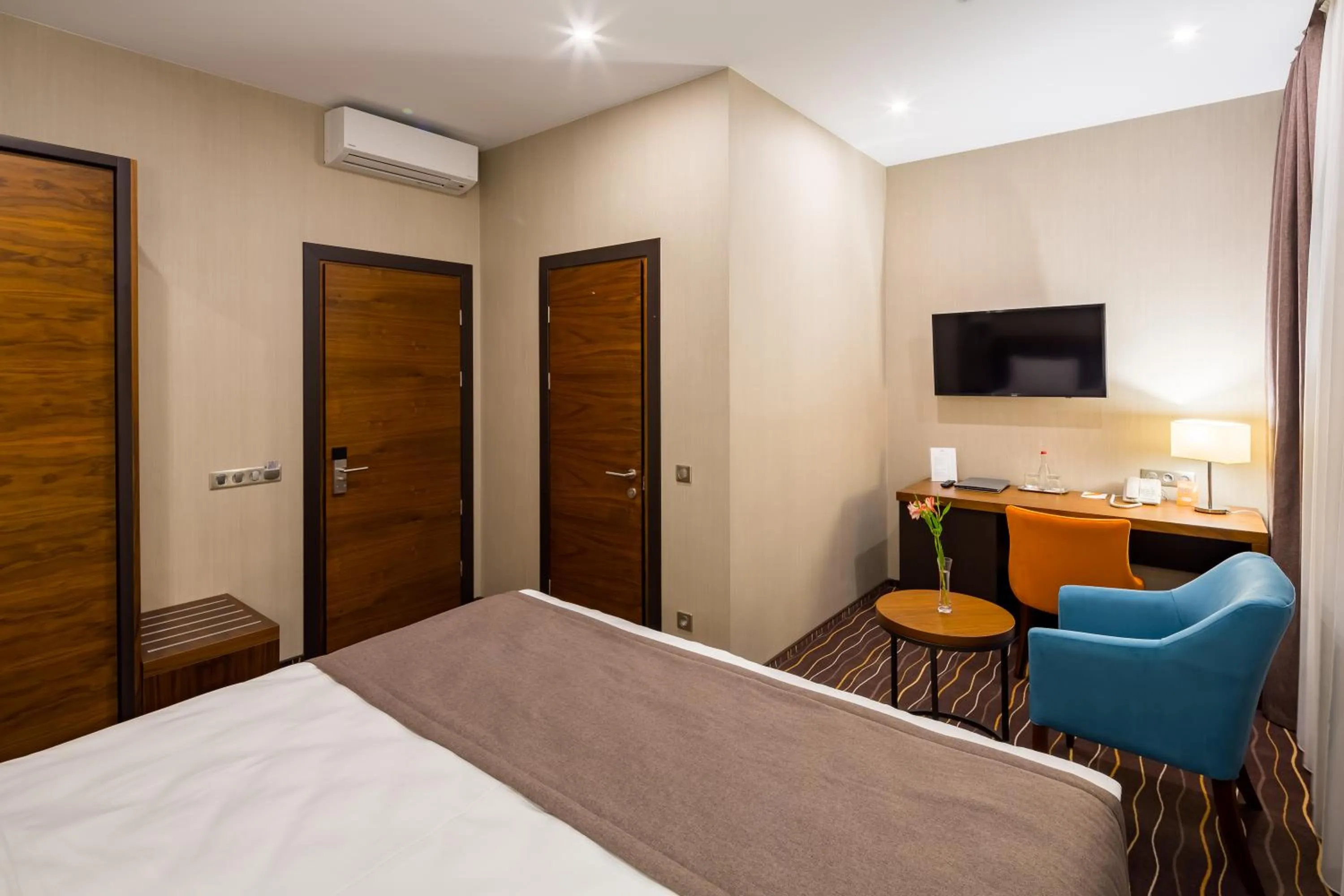 Bed in Taurus City Hotel