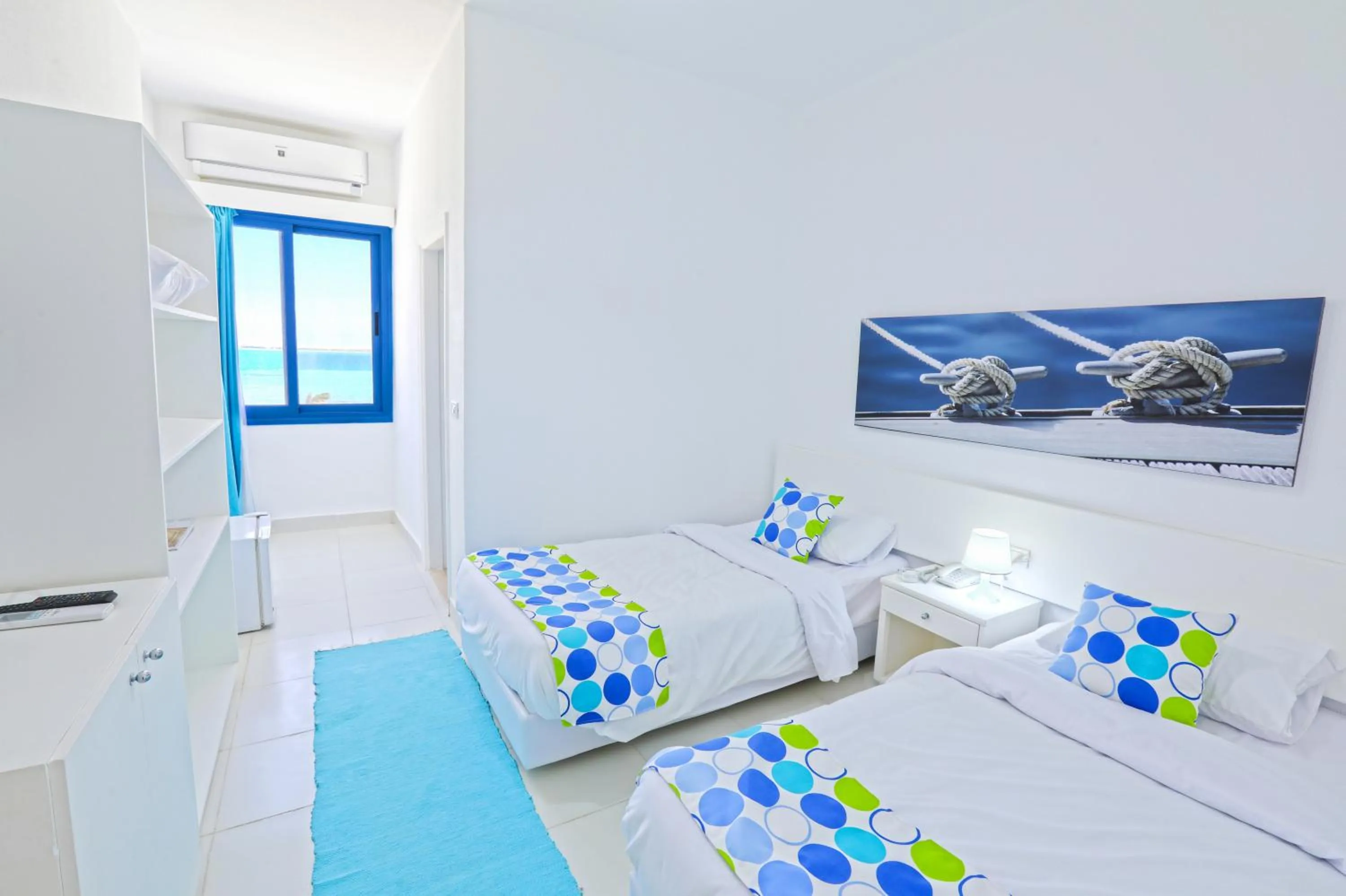 Bed in Lagoonie Lodge & Beach