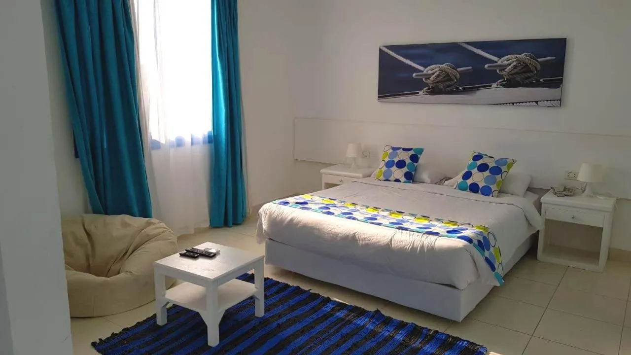 Bed in Lagoonie Lodge & Beach