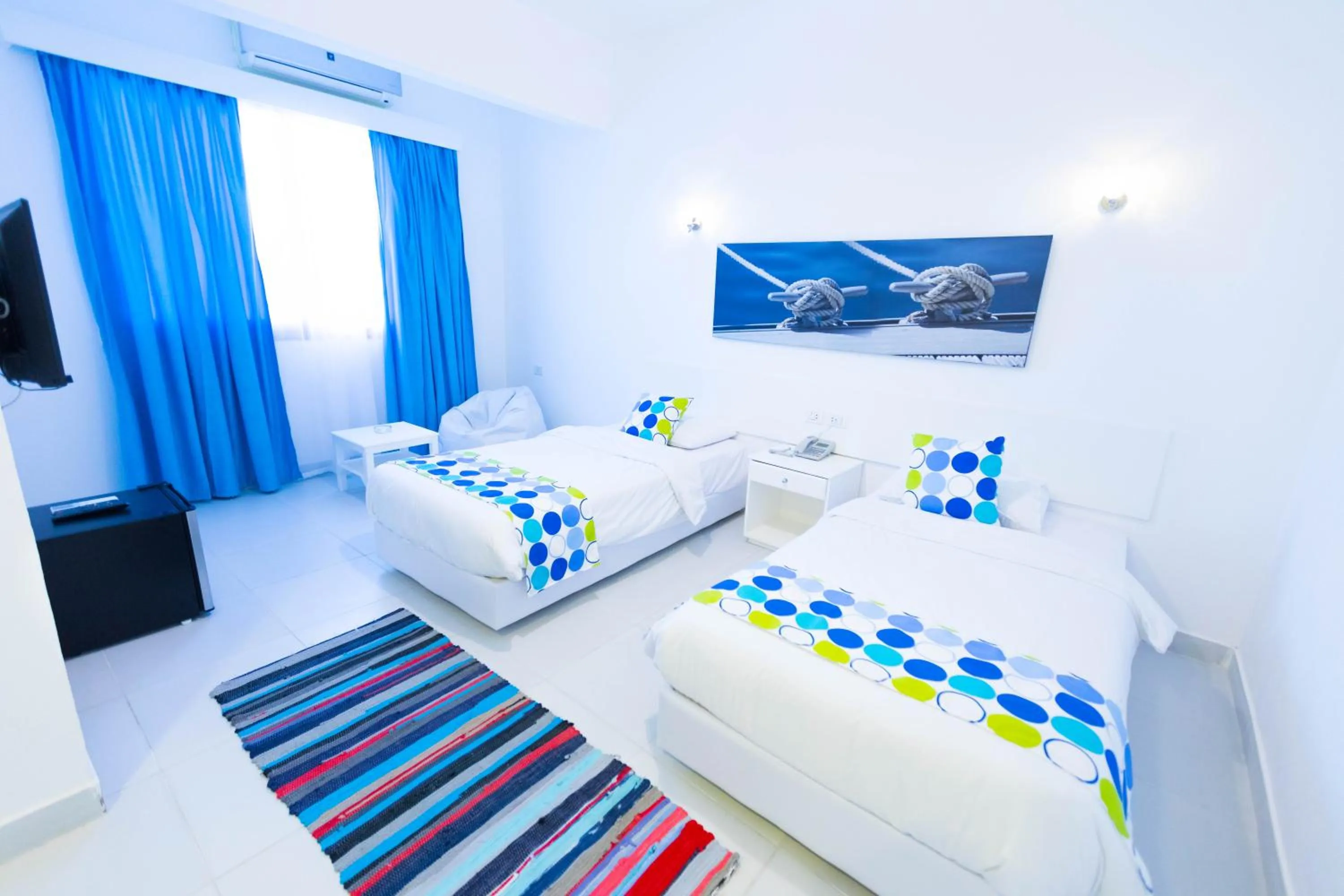 Bed in Lagoonie Lodge & Beach