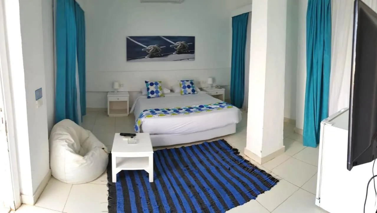 Bed in Lagoonie Lodge & Beach
