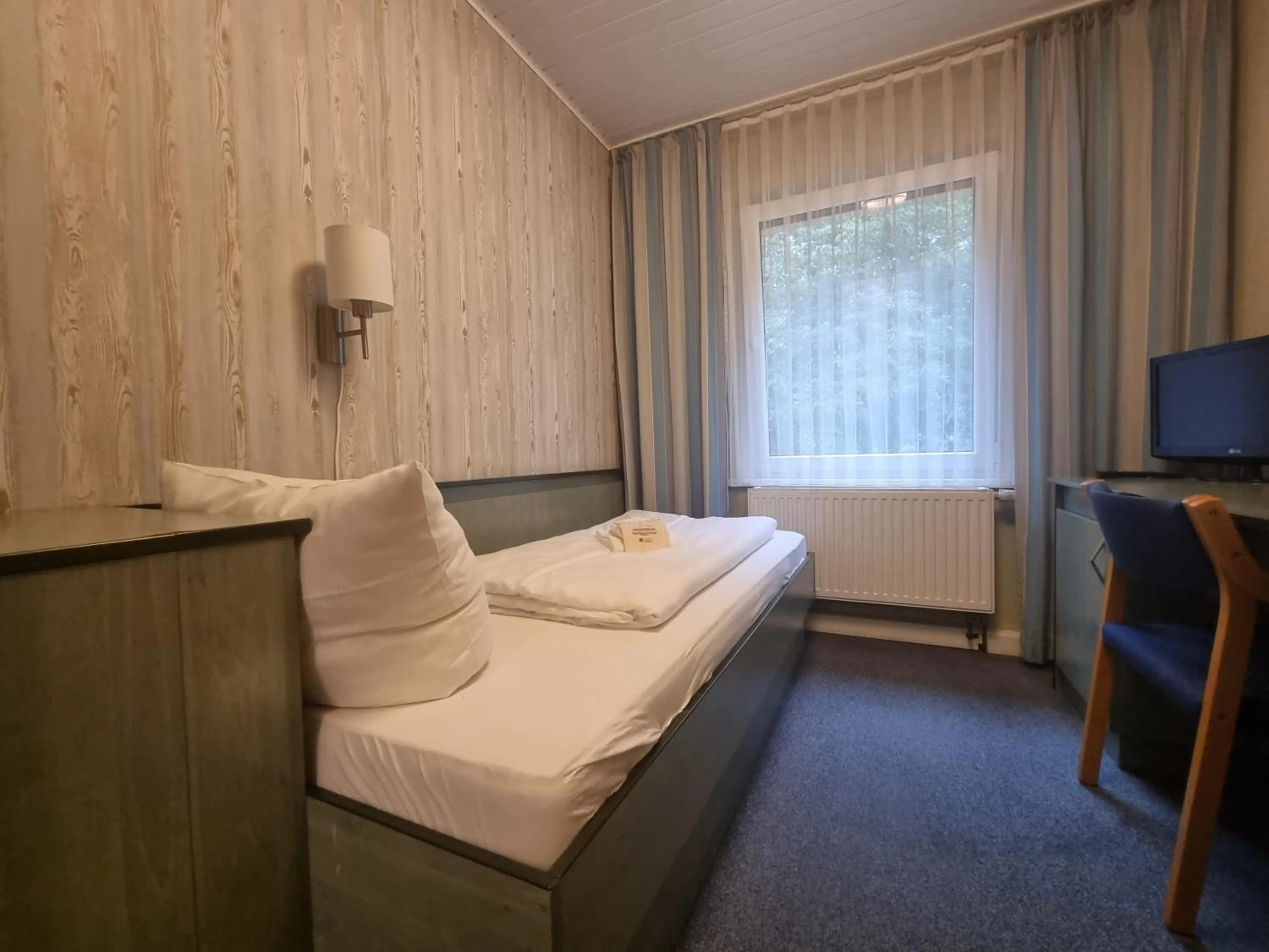 Bedroom, Bed in Gästehaus Chorin