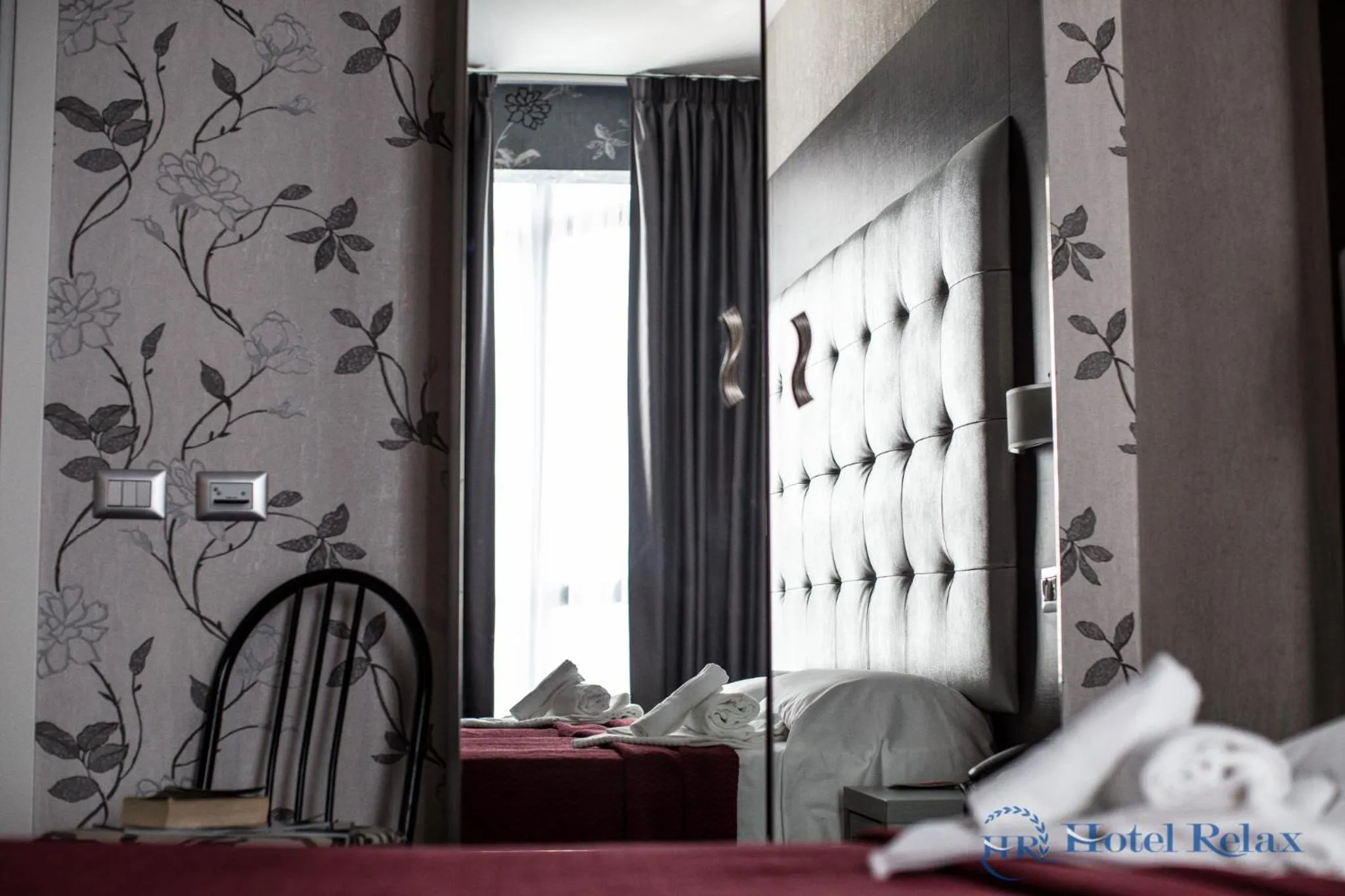 Decorative detail, Bed in Hotel Relax Roma Nord