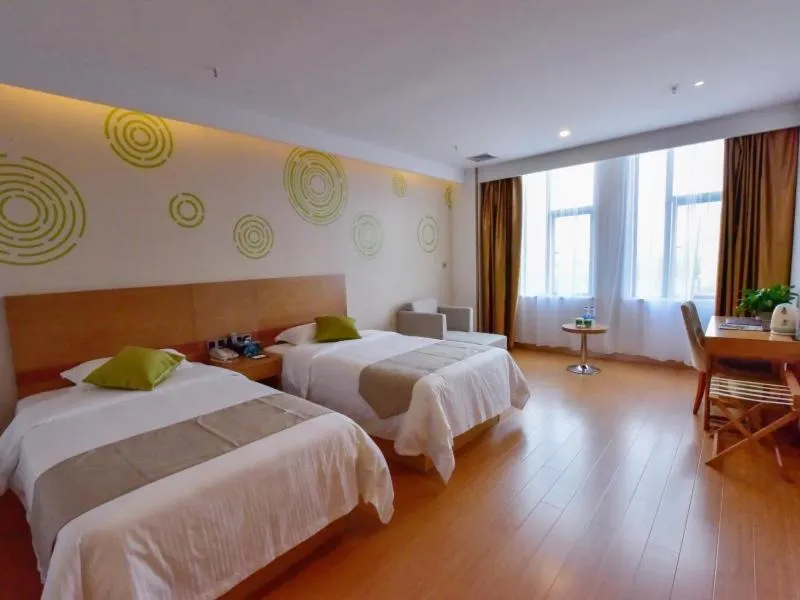 Bed in GreenTree Inn Huanggang Qichun County Ouyada Square Express Hotel