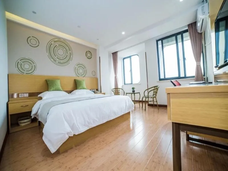 Bed in GreenTree Inn Zhejiang Ningbo District Huashan Road And Huanghe Road Express Hotel