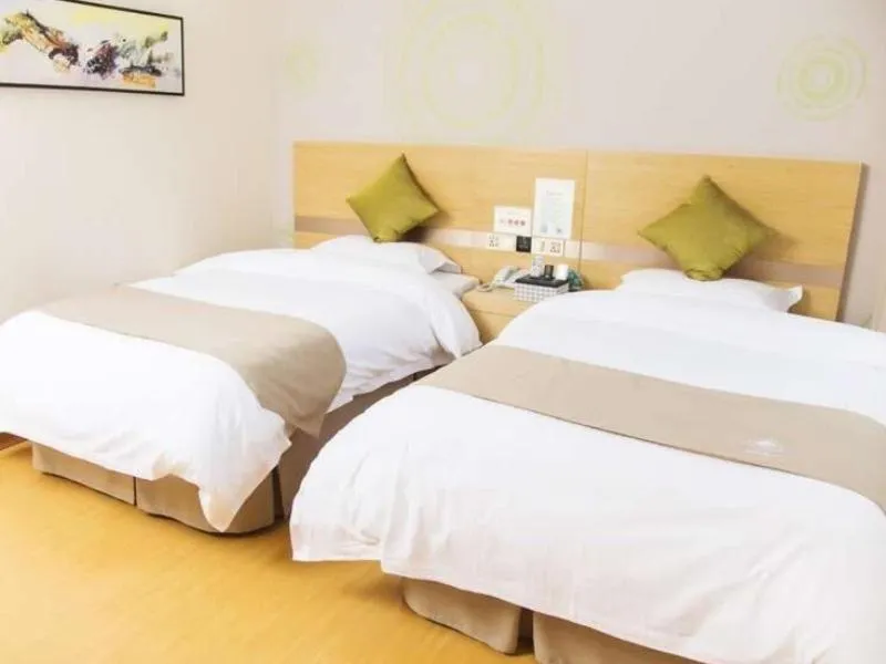 Bed in GreenTree Inn Jiangsu Yancheng Dafeng port Sea world Hotel