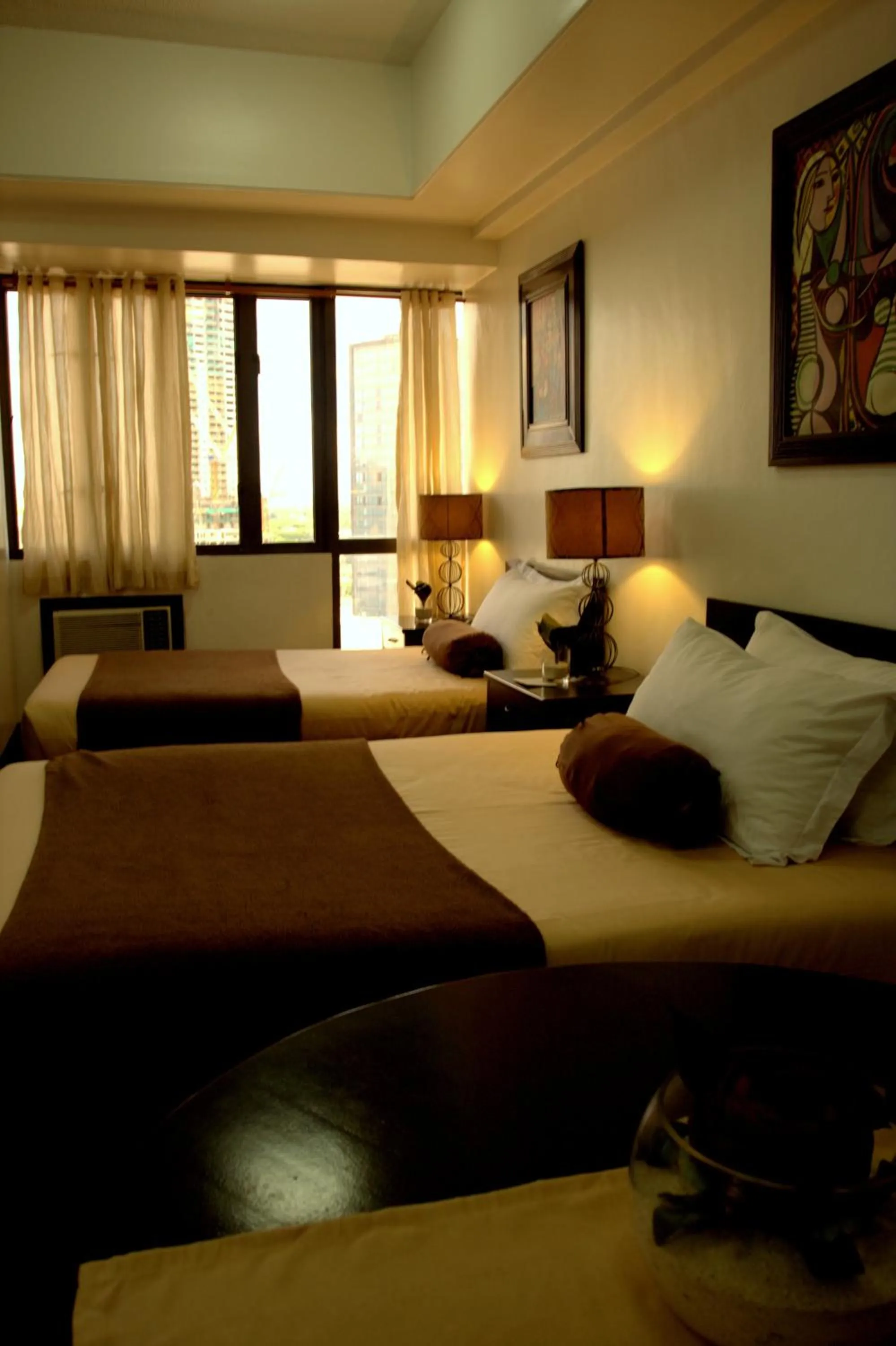 Bed in Prince Plaza II Condotel