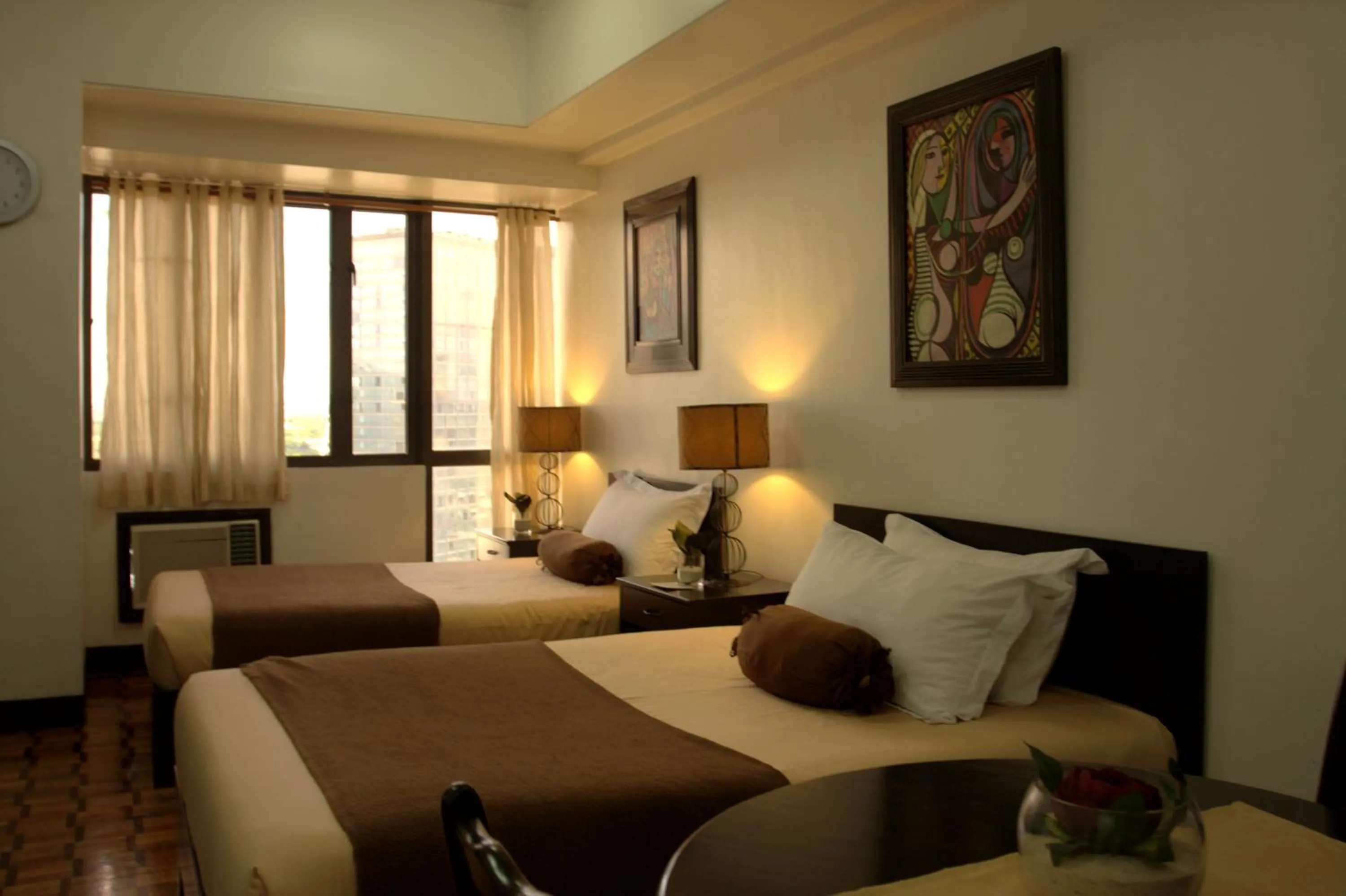 Bed in Prince Plaza II Condotel