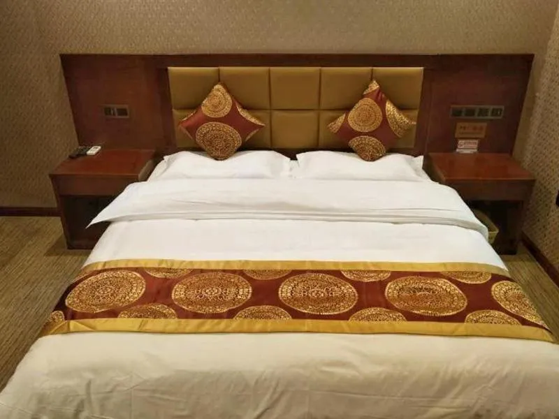 Bed in GreenTree Alliance Tacheng City Wenqin Road Zuoan Sunshine Hotel