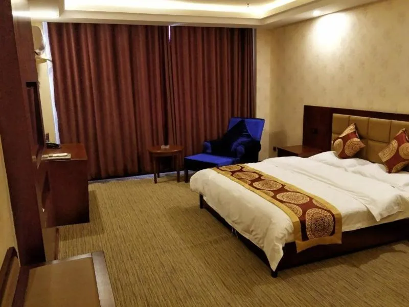 Bed in GreenTree Alliance Tacheng City Wenqin Road Zuoan Sunshine Hotel