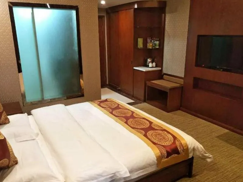 Bed in GreenTree Alliance Tacheng City Wenqin Road Zuoan Sunshine Hotel