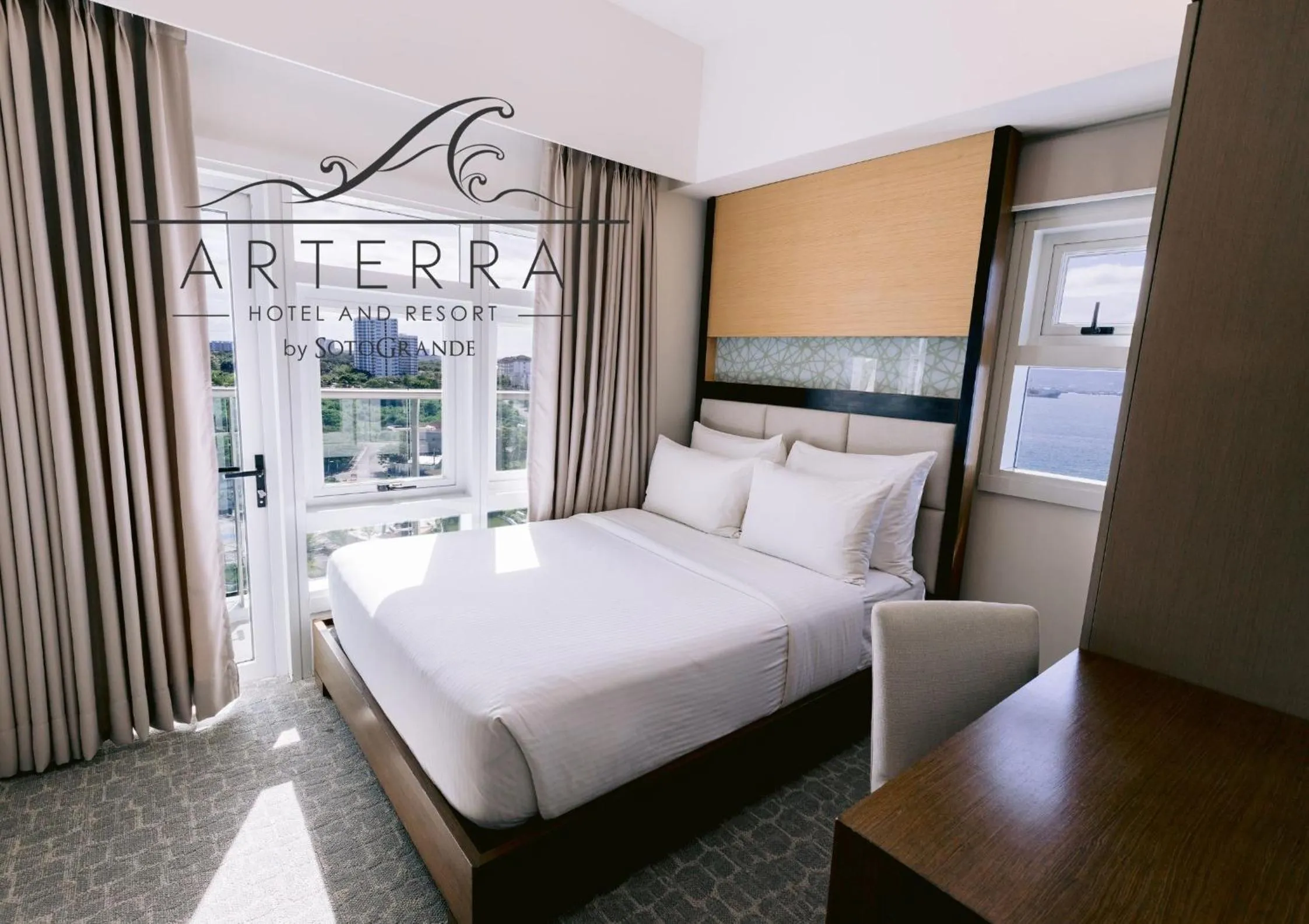 Bed in Arterra Hotel and Resort