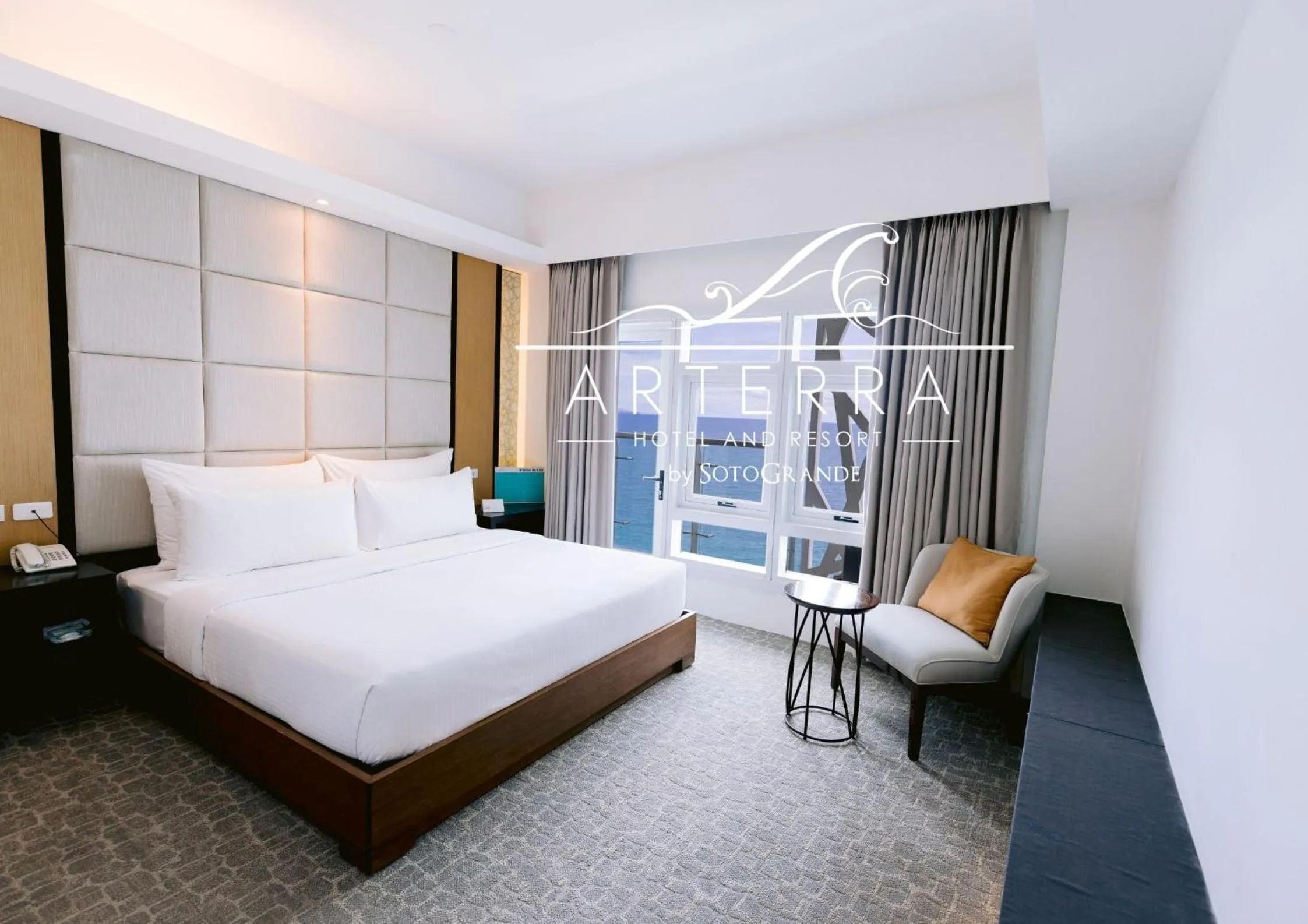 Bed in Arterra Hotel and Resort