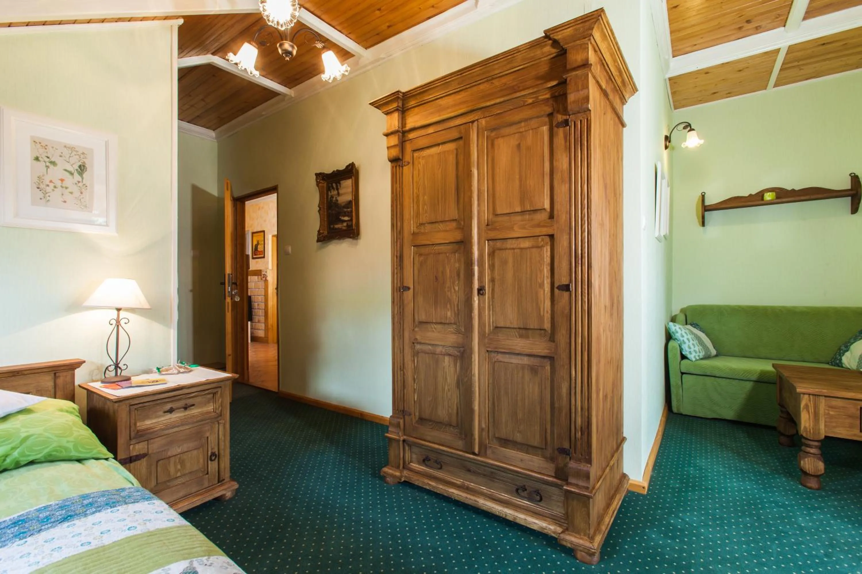 Bed in Villa Cynamon Jacuzzi & Sauna