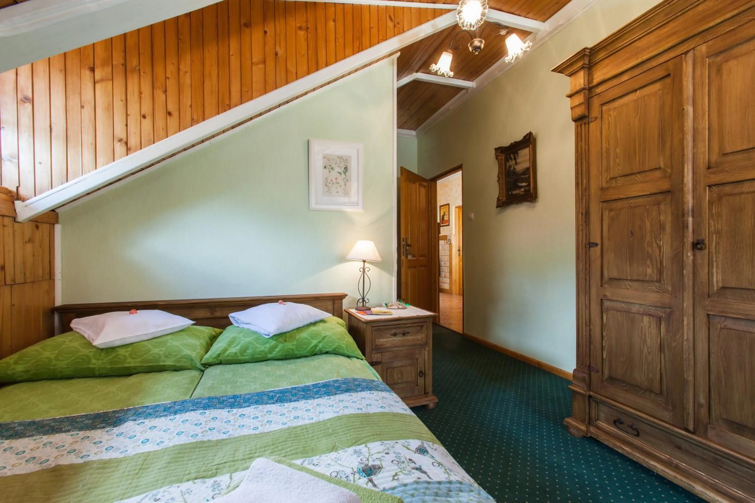 Bed in Villa Cynamon Jacuzzi & Sauna