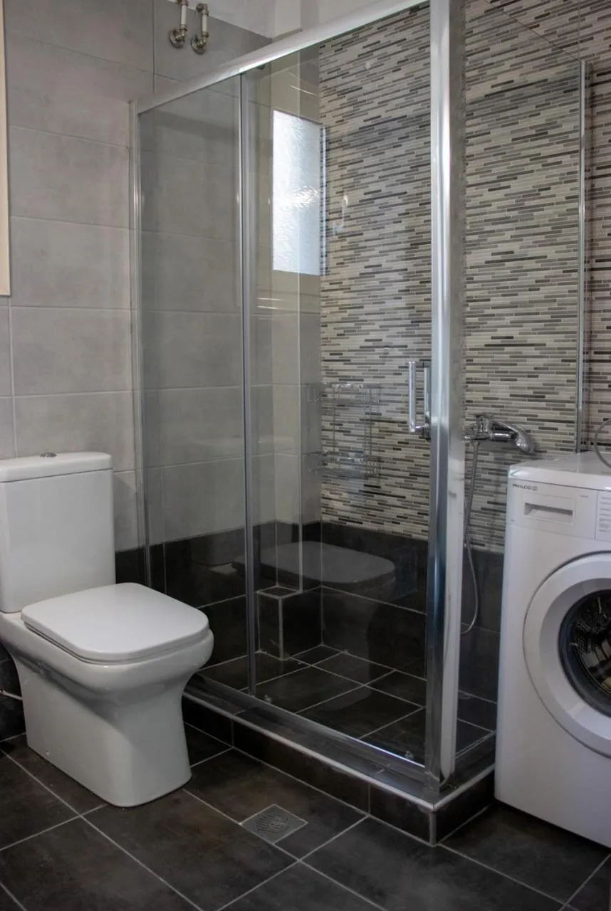 Shower in Grand Bleu Apartments & Villas