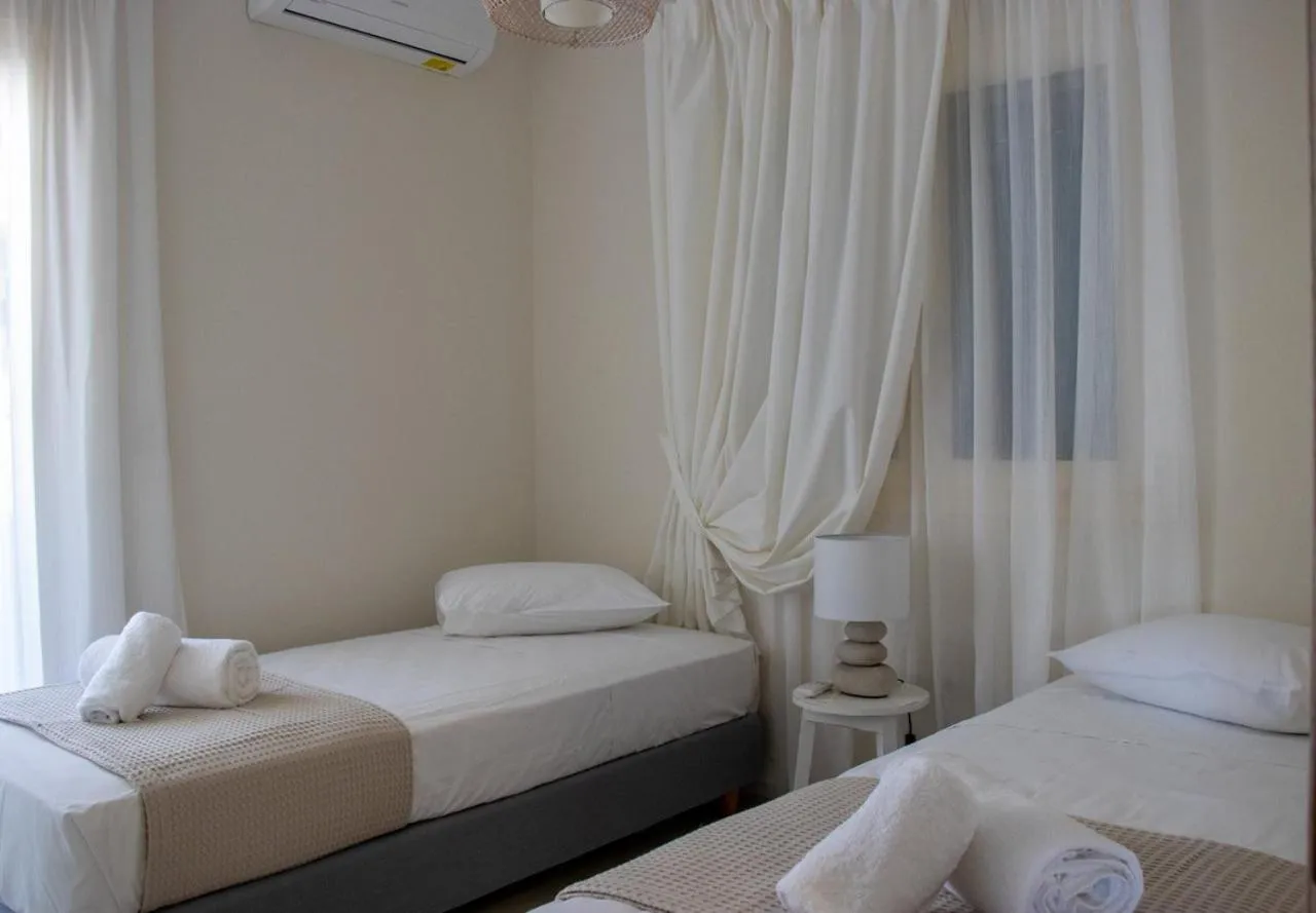 Bedroom, Bed in Grand Bleu Apartments & Villas