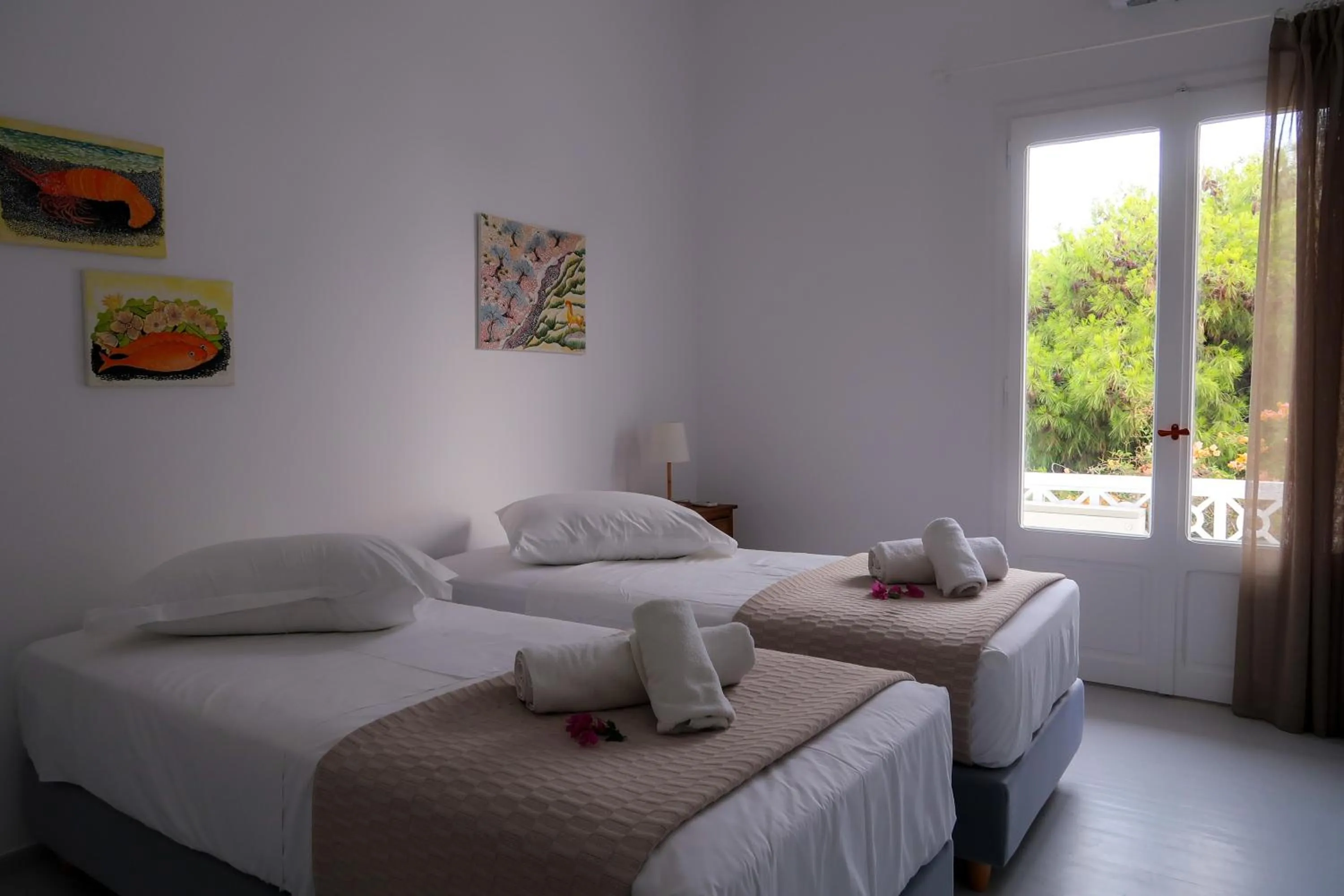 Bed in Grand Bleu Apartments & Villas