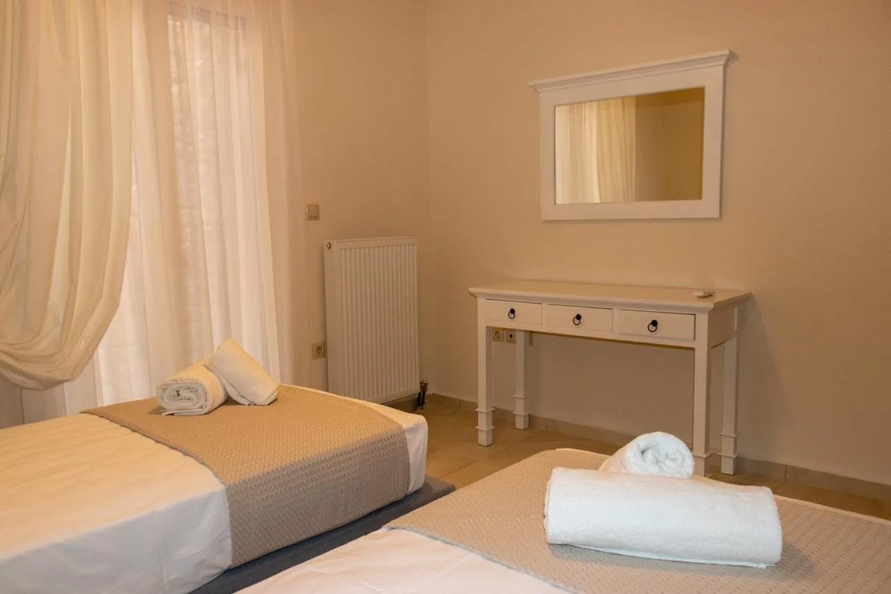 Bedroom, Bed in Grand Bleu Apartments & Villas