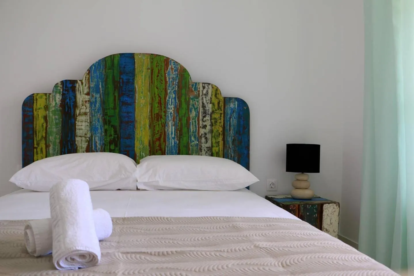 Bed in Grand Bleu Apartments & Villas