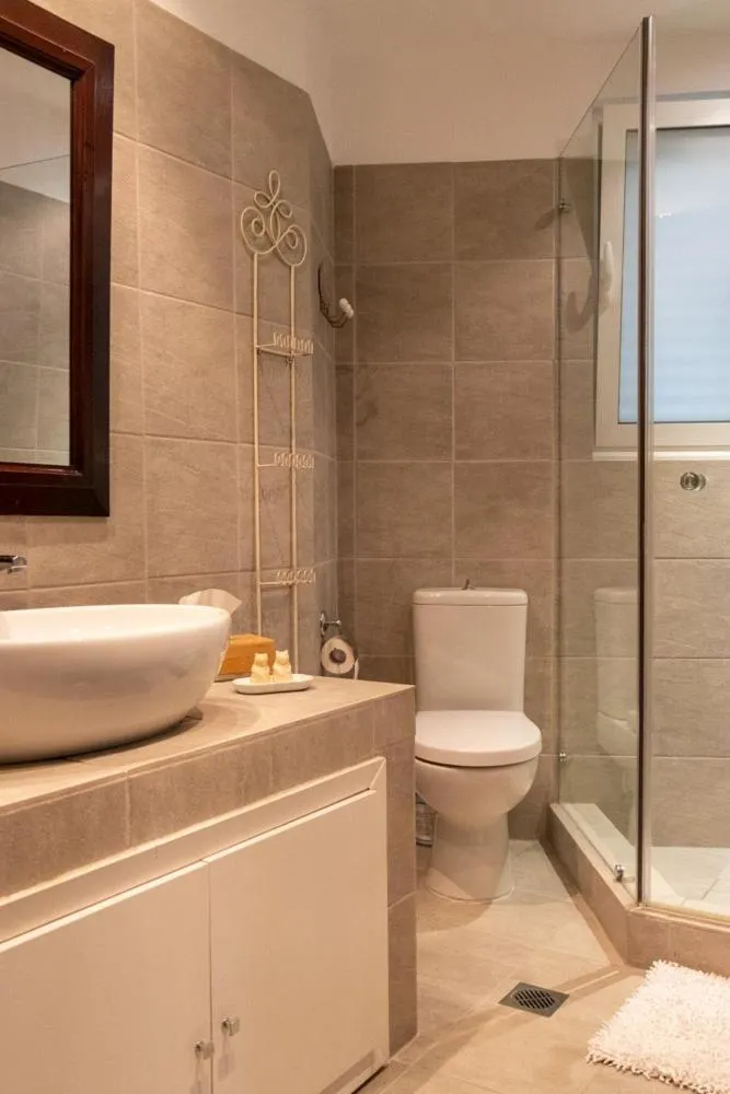 Bathroom in Grand Bleu Apartments & Villas