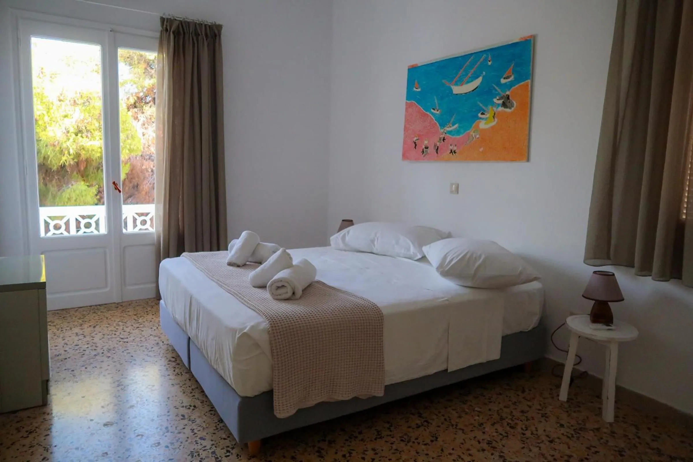Bed in Grand Bleu Apartments & Villas