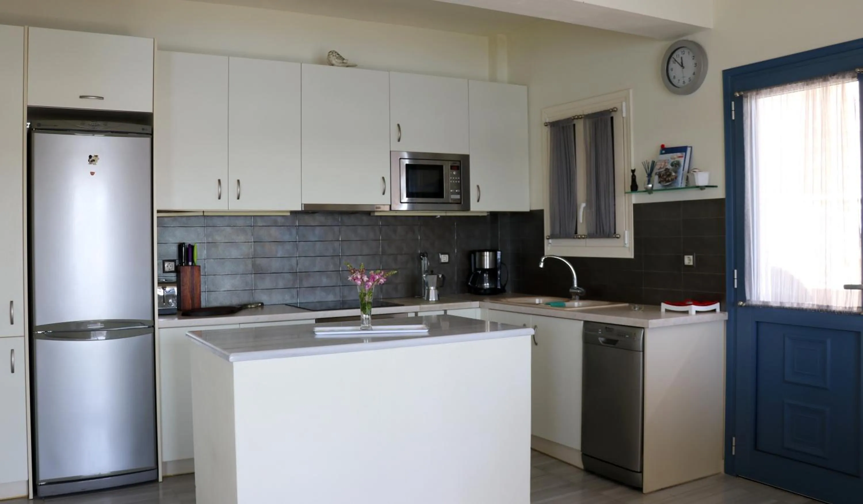 Kitchen or kitchenette in Grand Bleu Apartments & Villas