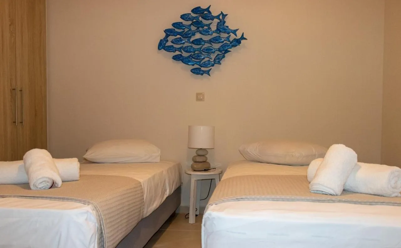 Bedroom, Bed in Grand Bleu Apartments & Villas