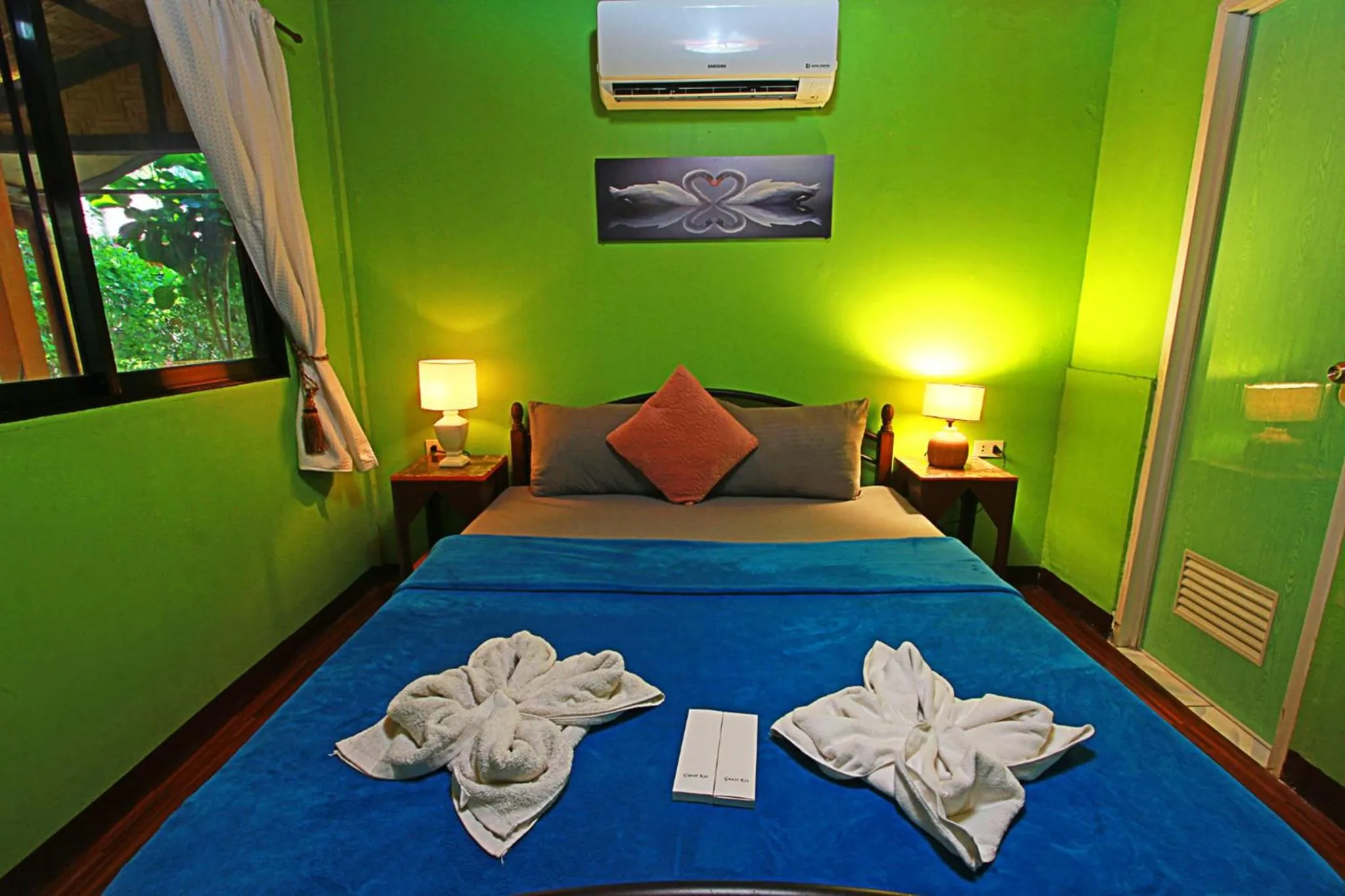 Bed in Adriana's Place Tropical Guesthouse