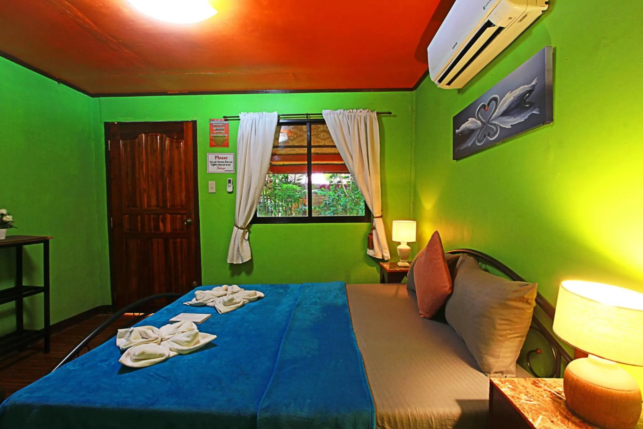 Bed in Adriana's Place Tropical Guesthouse