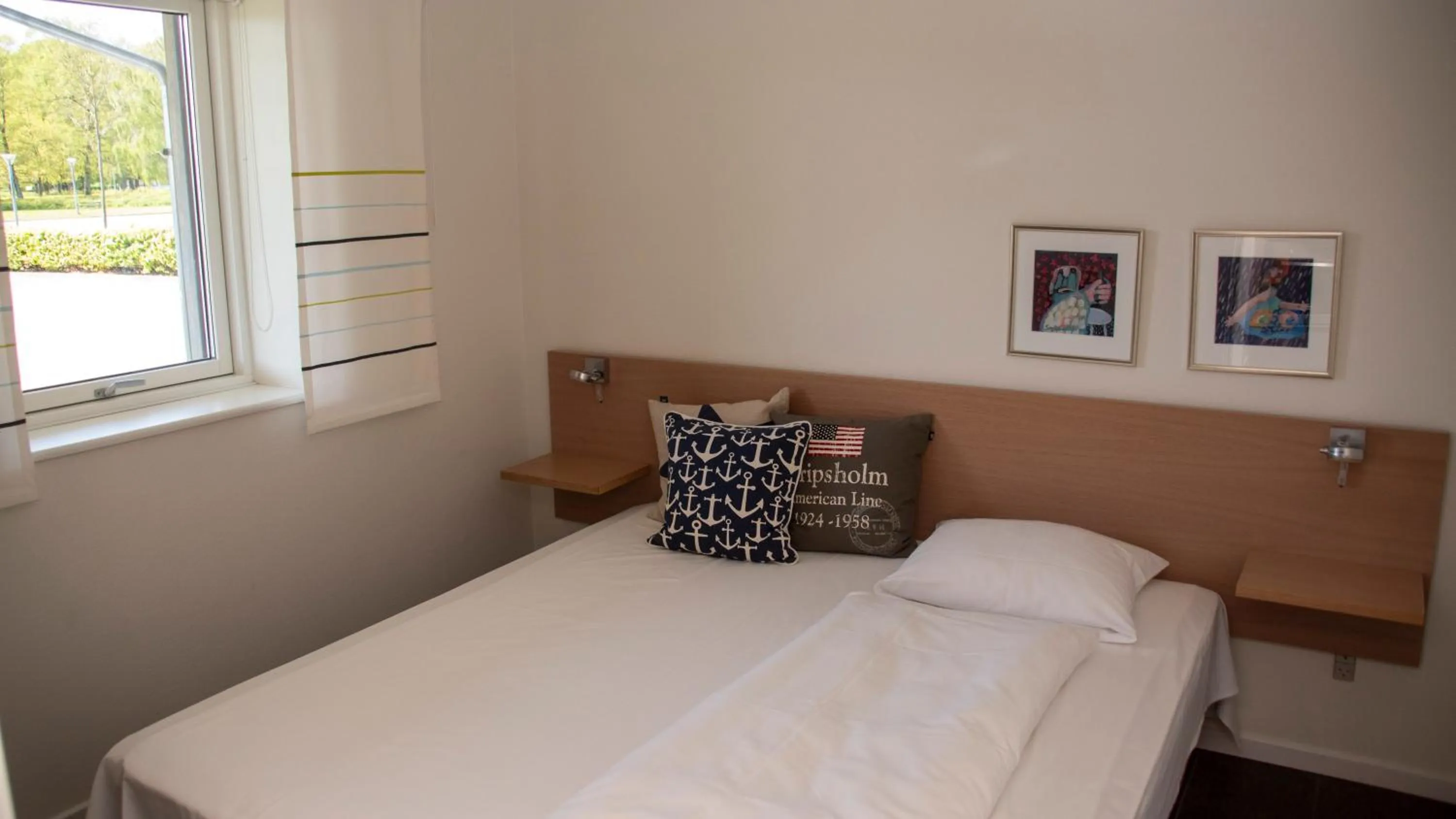 Photo of the whole room, Bed in Hotel Strandtangen