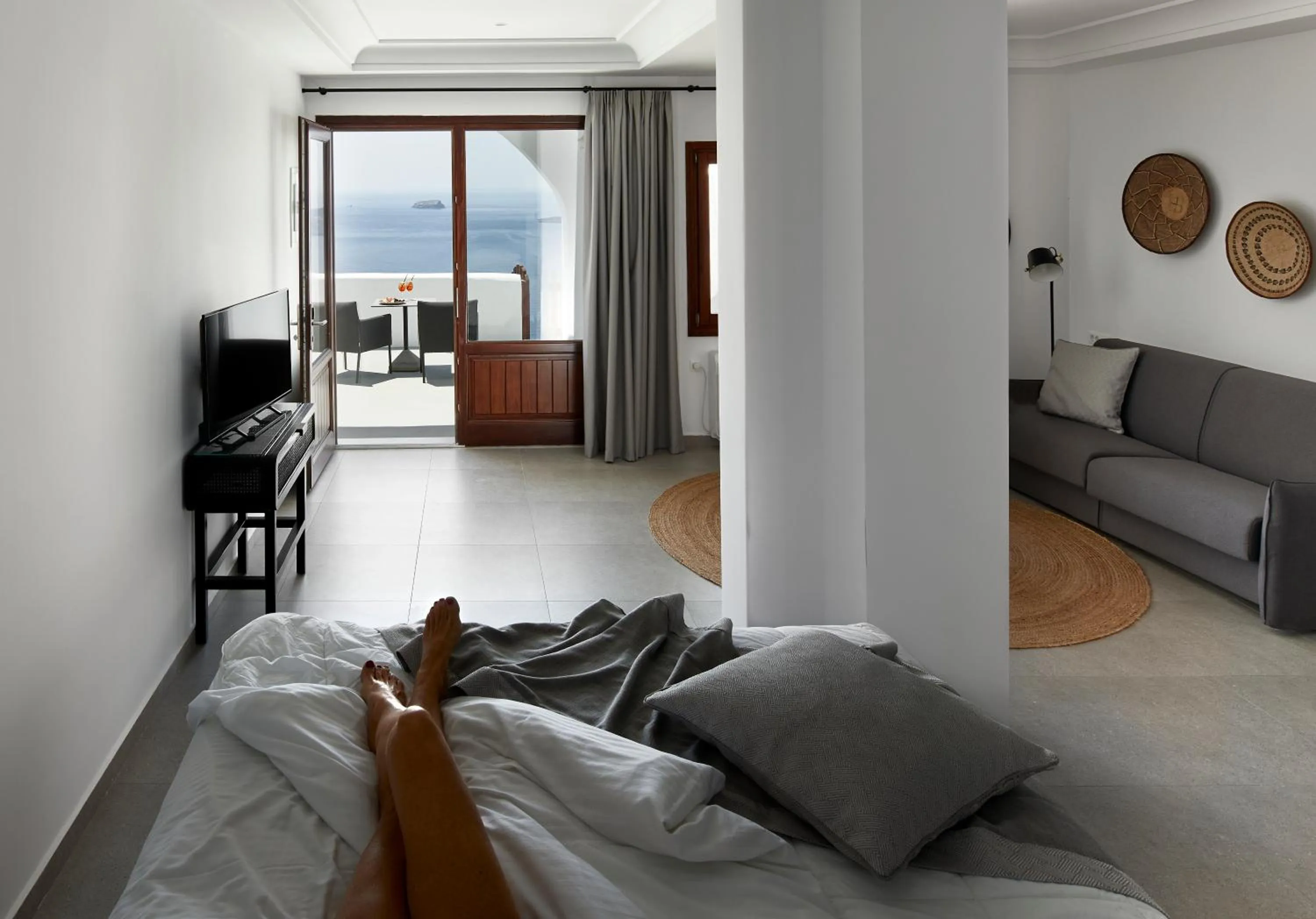 Bed in Petit Palace Suites