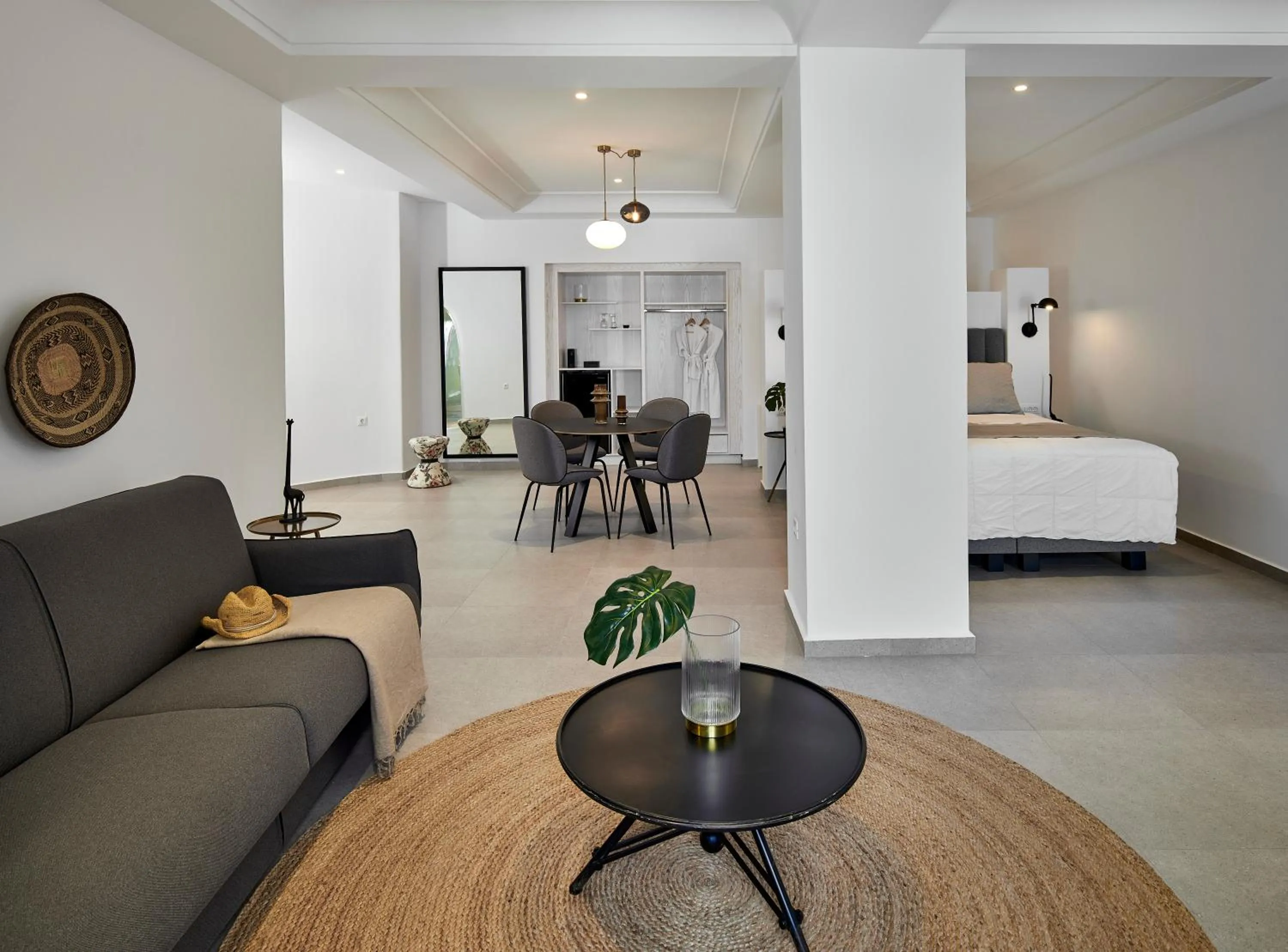 Bed in Petit Palace Suites