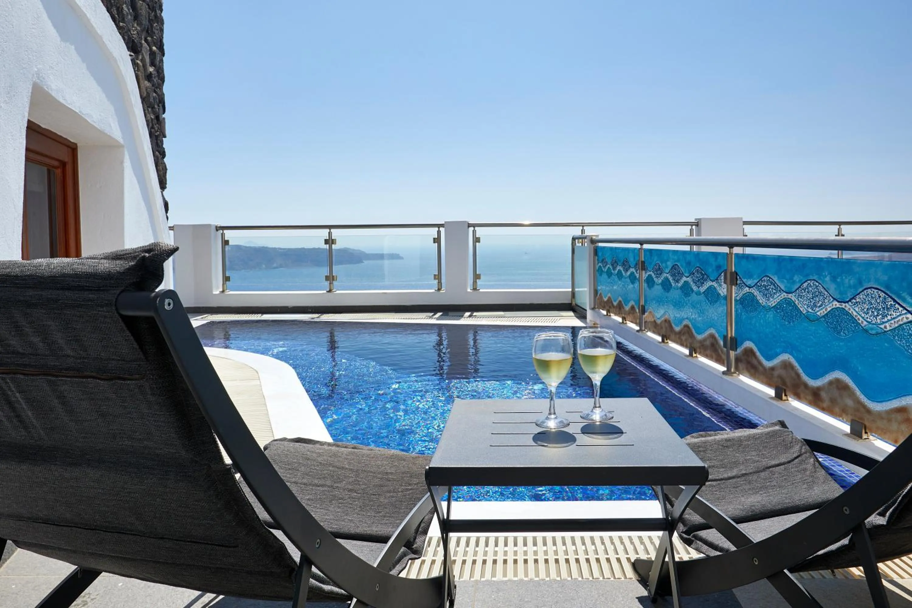 Swimming pool in Petit Palace Suites