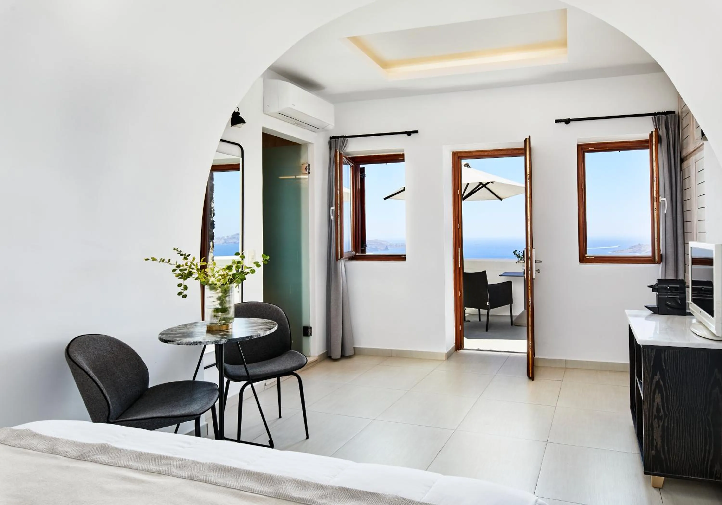 Bedroom in Petit Palace Suites