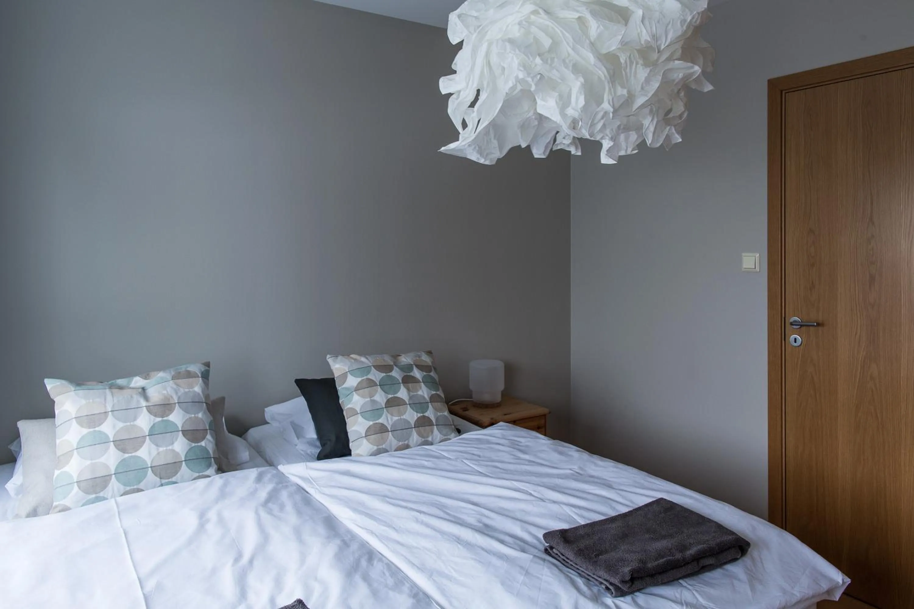 Bed in Acco Luxury Apartments