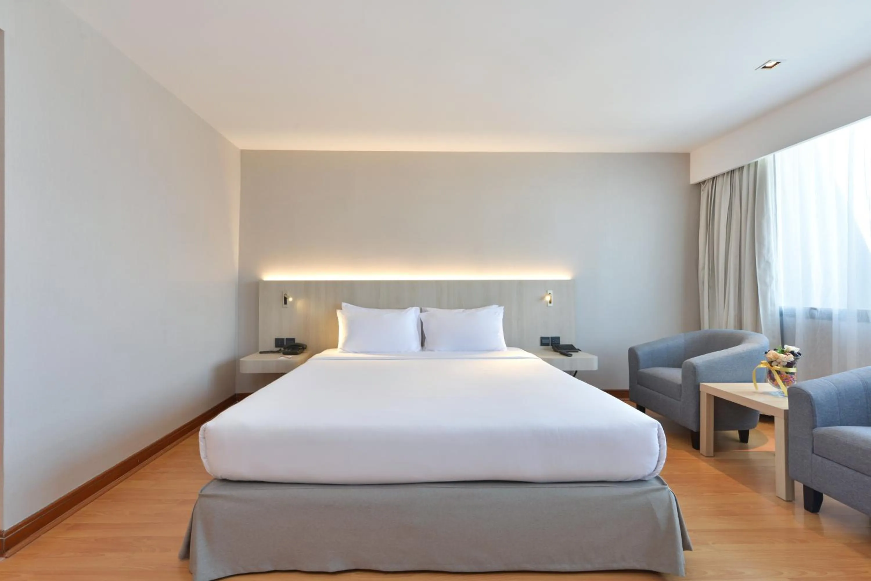 Bed in Twin Towers Hotel