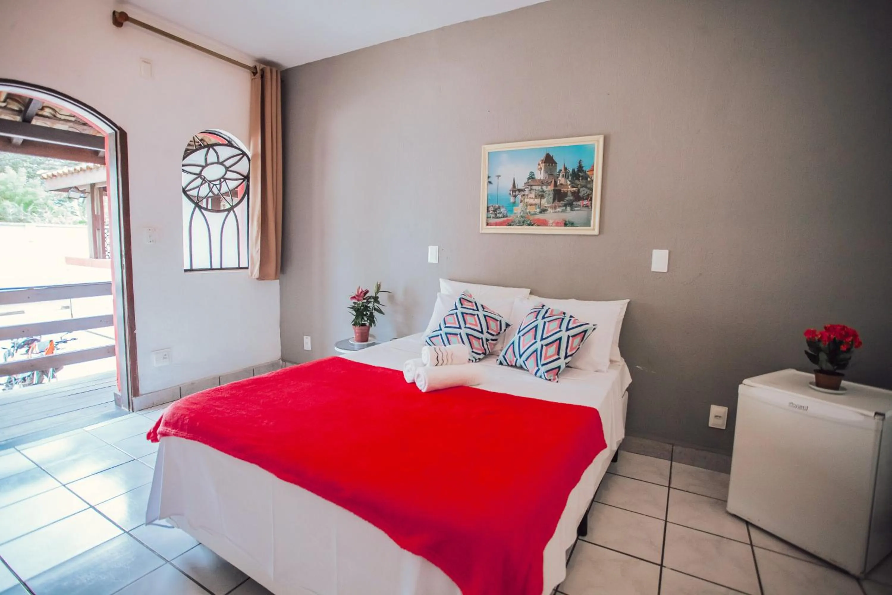 Bed in Pousada Chale Suísso