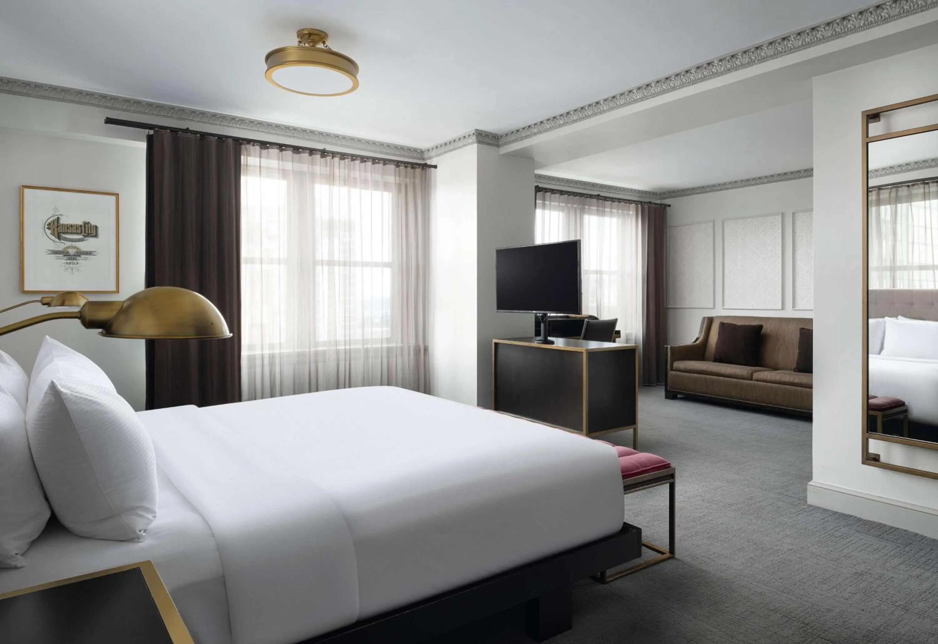 Bed in Hotel Phillips Kansas City, Curio Collection By Hilton