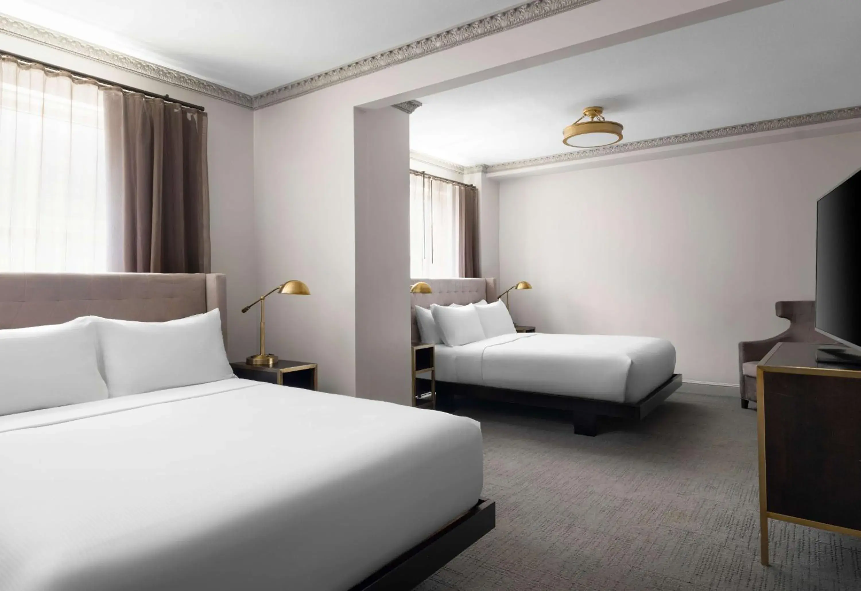 Queen Room with Two Queen Beds in Hotel Phillips Kansas City, Curio Collection By Hilton Queen Room with Two Queen Beds in Hotel Phillips Kansas City, Curio Collection By Hilton